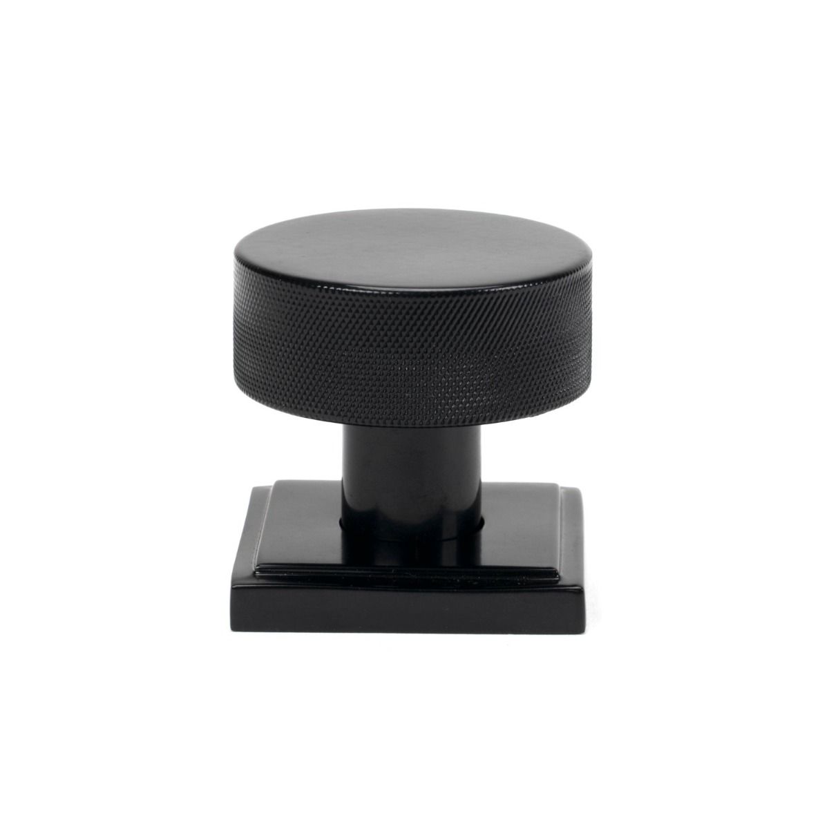 The Knurled Mortice/Rim Knob Set on a Square Rose in Black Shown Upright on a White Background 