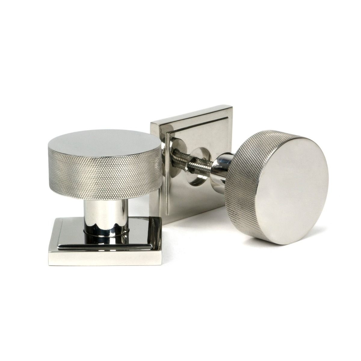 The Knurled Mortice/Rim Knob Set on a Square Rose in Polished Stainless Steel Shown Upright and on its Side 