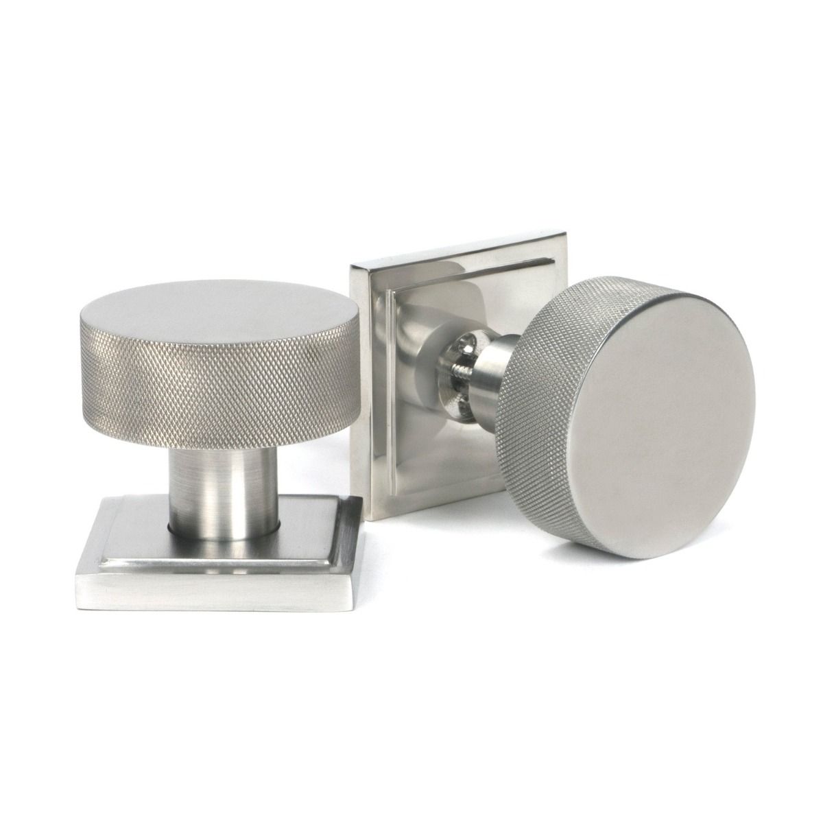 The Knurled Mortice/Rim Knob Set on a Square Rose in Satin Stainless Steel Shown Upright and on its Side 