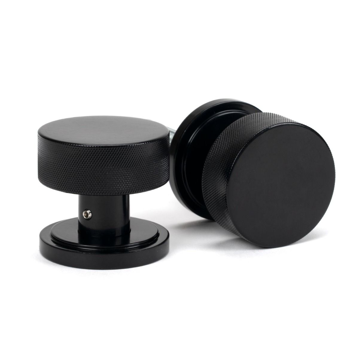 The Knurled Mortice/Rim Knob Set on an Art Deco Rose in Black Shown Upright and on its Side 