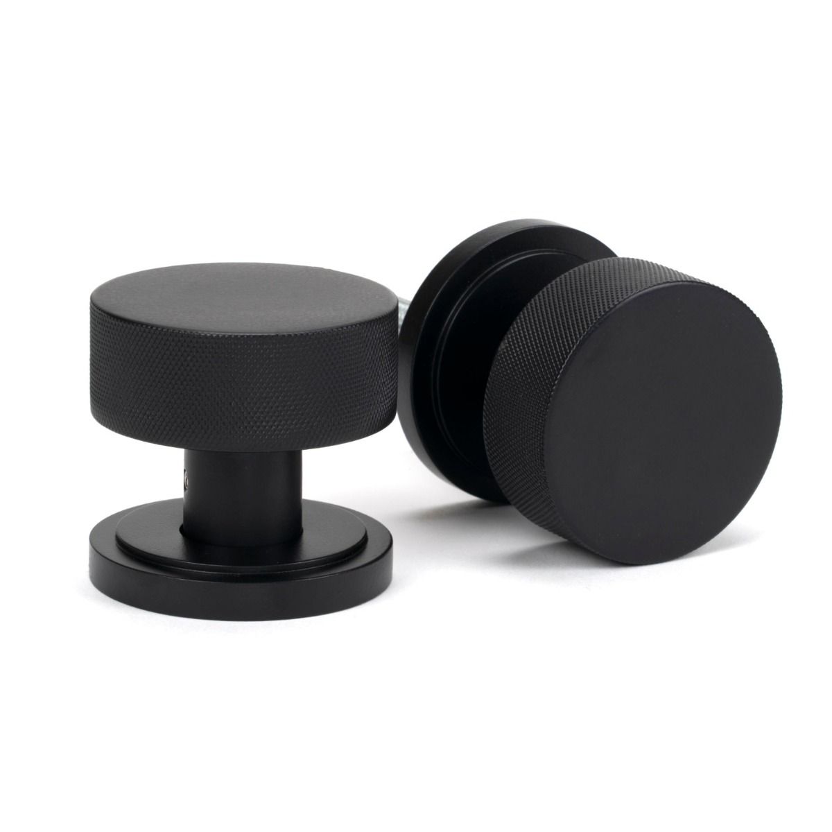The Knurled Mortice/Rim Knob Set on an Art Deco Rose in Matt Black Shown Upright and on its Side 