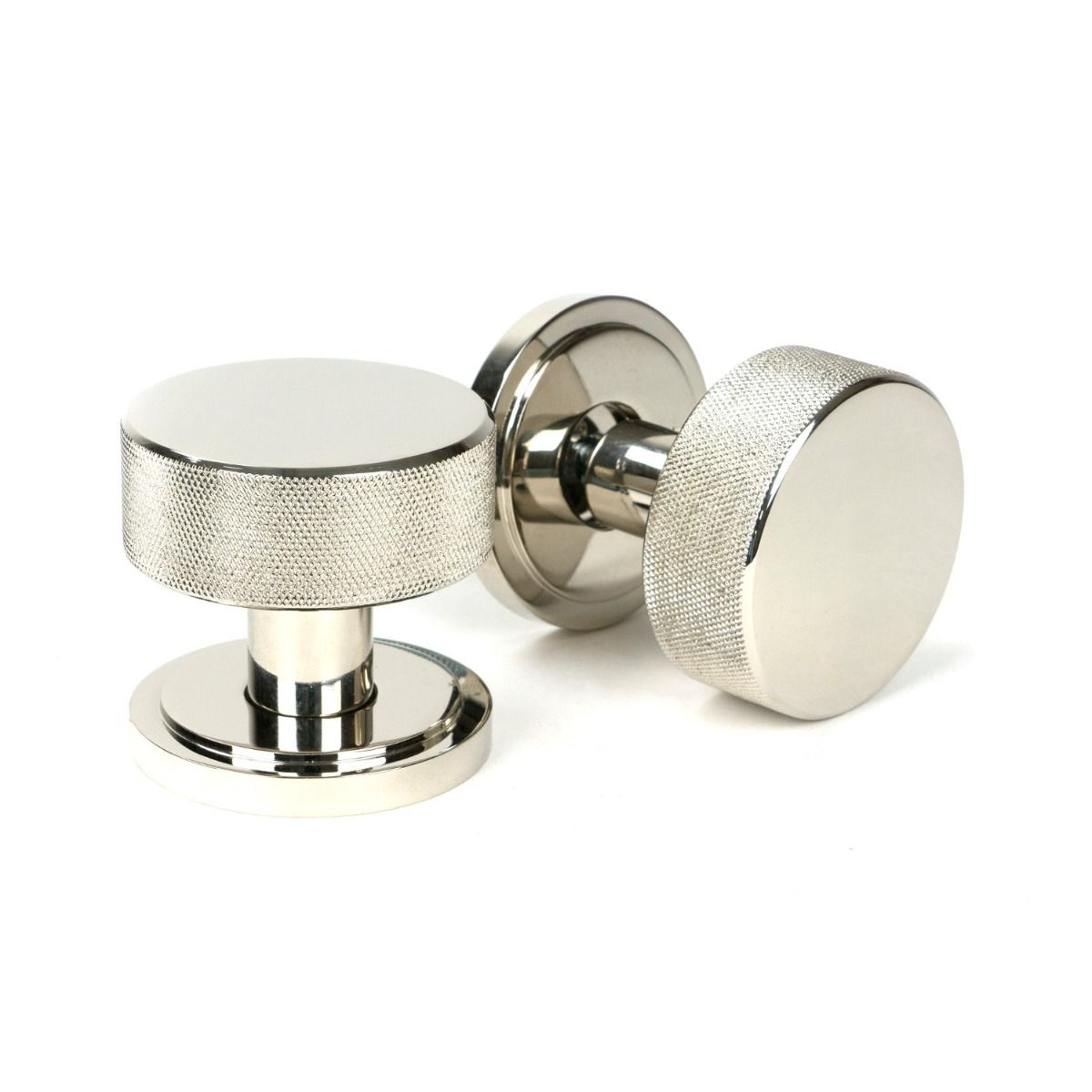 The Knurled Mortice/Rim Knob Set on an Art Deco Rose in Polished Nickel Shown Upright and on its Side 