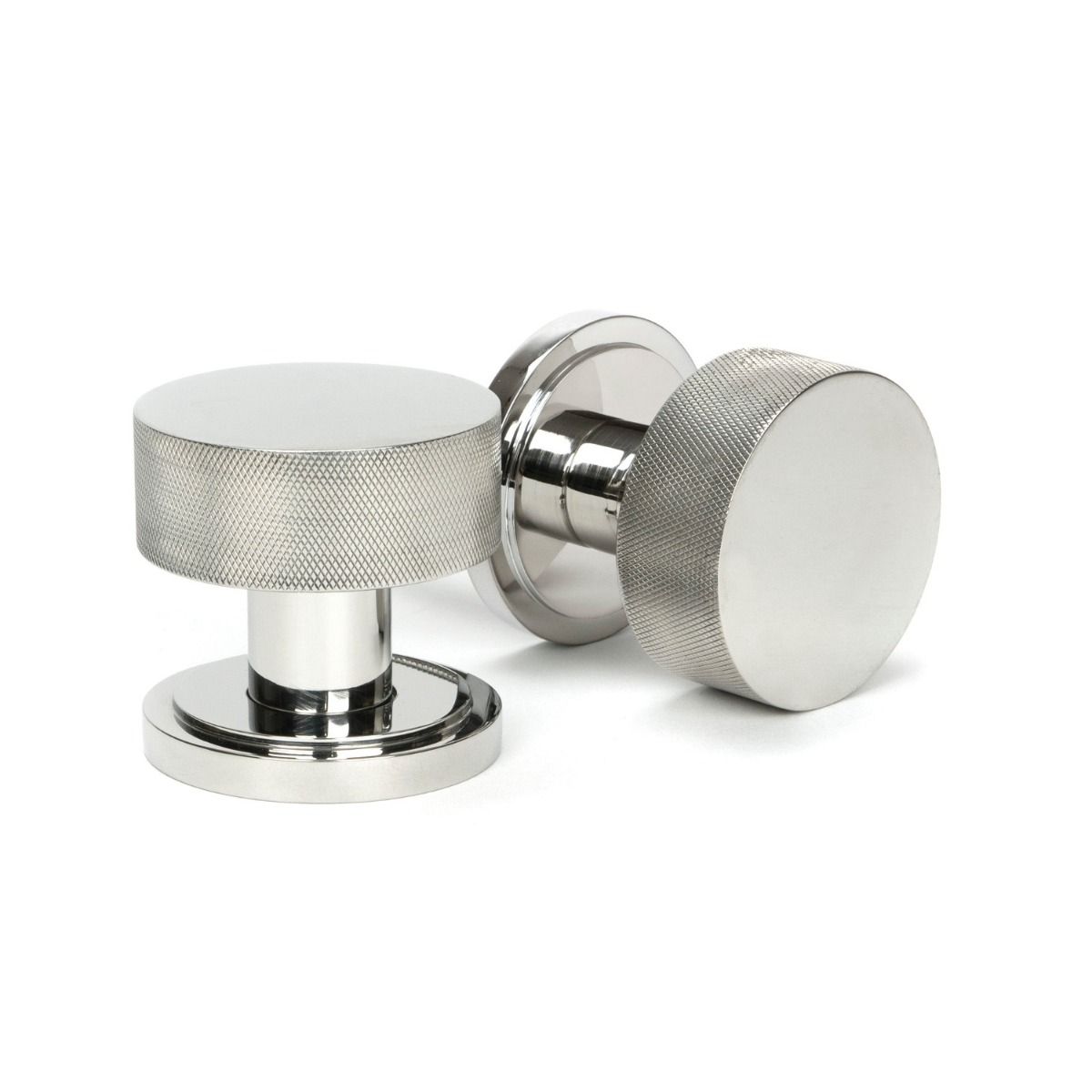 The Knurled Mortice/Rim Knob Set on an Art Deco Rose in Polished Stainless Steel Shown Upright and on its Side 
