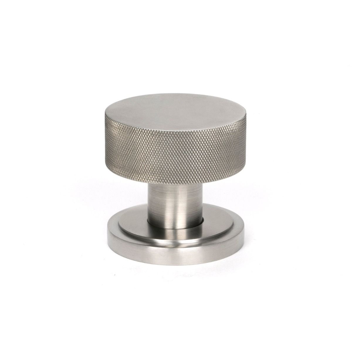The Knurled Mortice/Rim Knob Set on an Art Deco Rose in Satin Stainless Steel Shown Upright on a White Background 