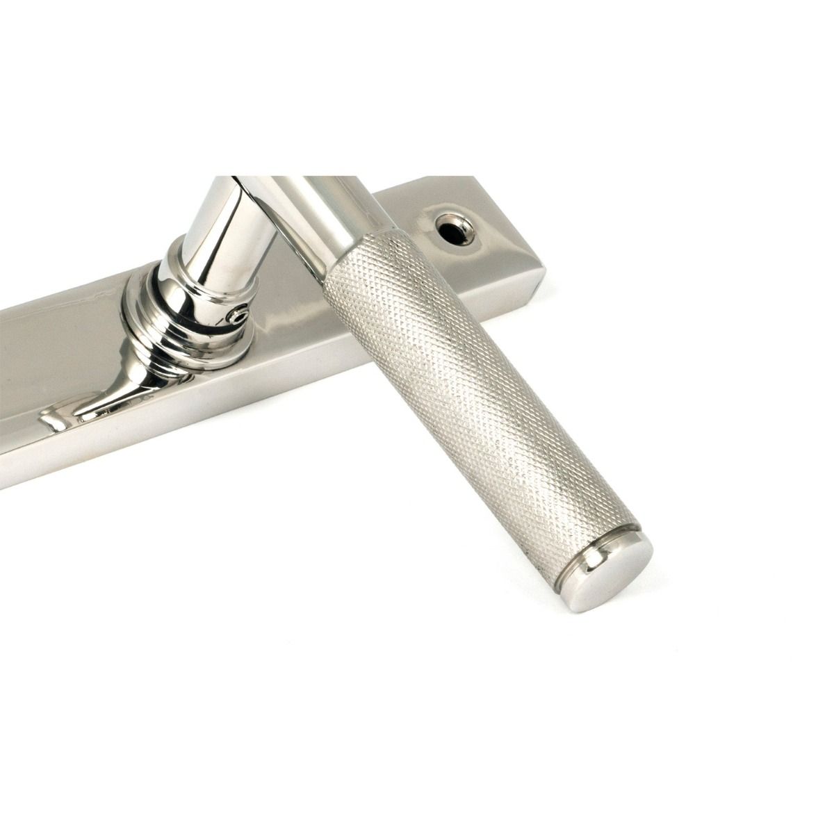 The Knurled Slimline Lever Espagnolette Door Handle Set in Polished Stainless Steel Showing a Close up of the Knurled Handle