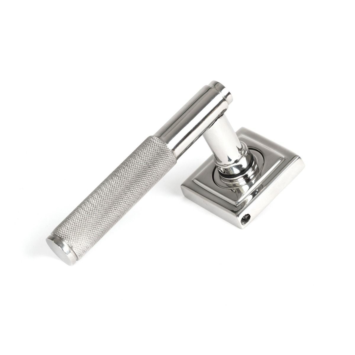 The Knurled Sprung Handle Set on a Square Rose in Satin Stainless Steel Shown at an Angle on a White Background
