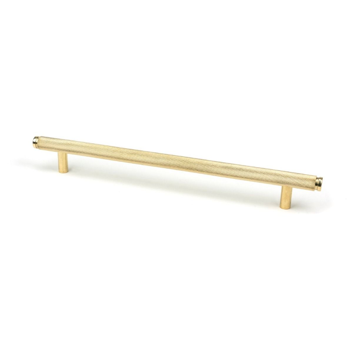 The Large Knurled Cabinet Pull Handle in Polished Brass Shown Upright on a White Background