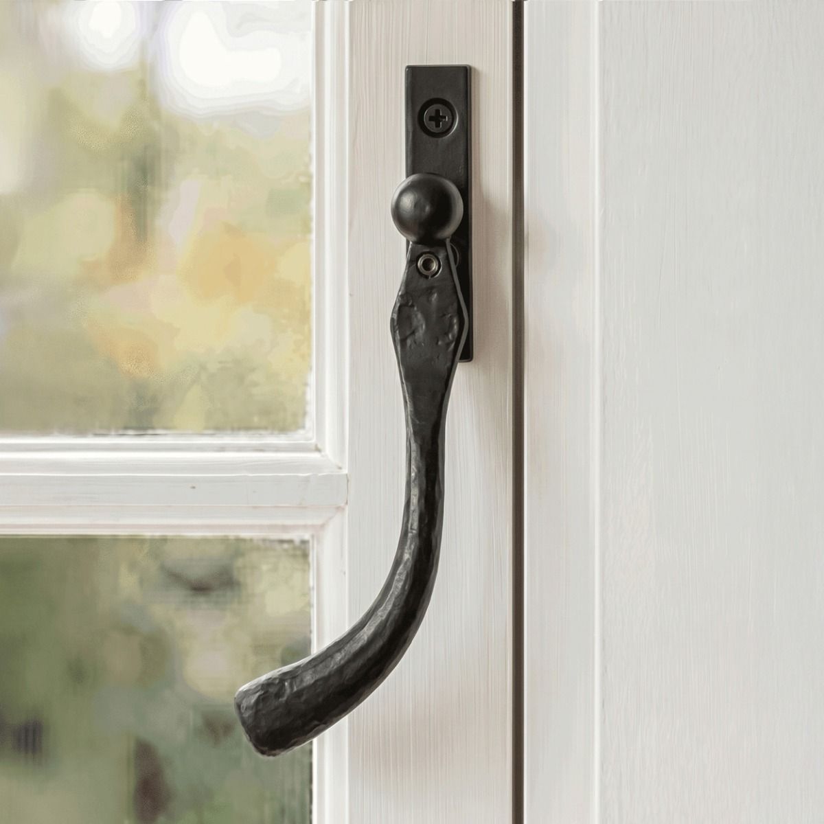 The Left Handed 16mm Beeswax Peardrop Espagnolette Window Handle on a Traditional White Wooden Window Frame - Digital Illustration