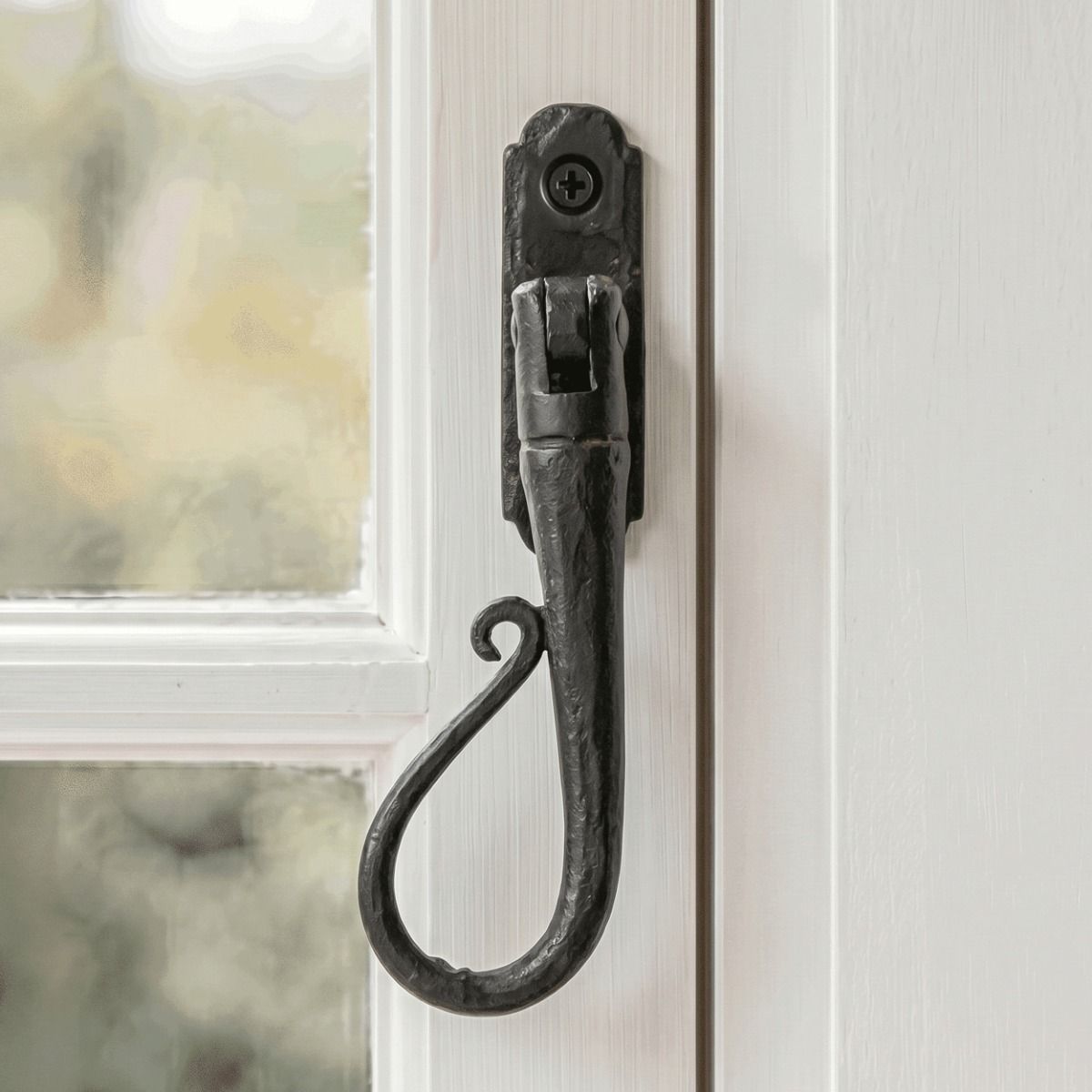 The Left Handed 20mm Beeswax Shepherd"s Crook Espagnolette Window Handle Fitted on a Traditional White Hand Painted Window Frame - Digital Illustration 