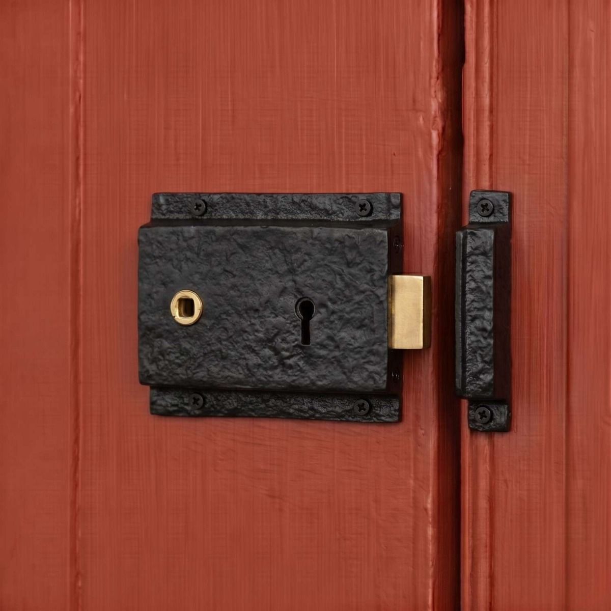 The Left Handed "Almerry" Black Iron Rim Lock on an Orange Door to a Country Home - Digital Illustration