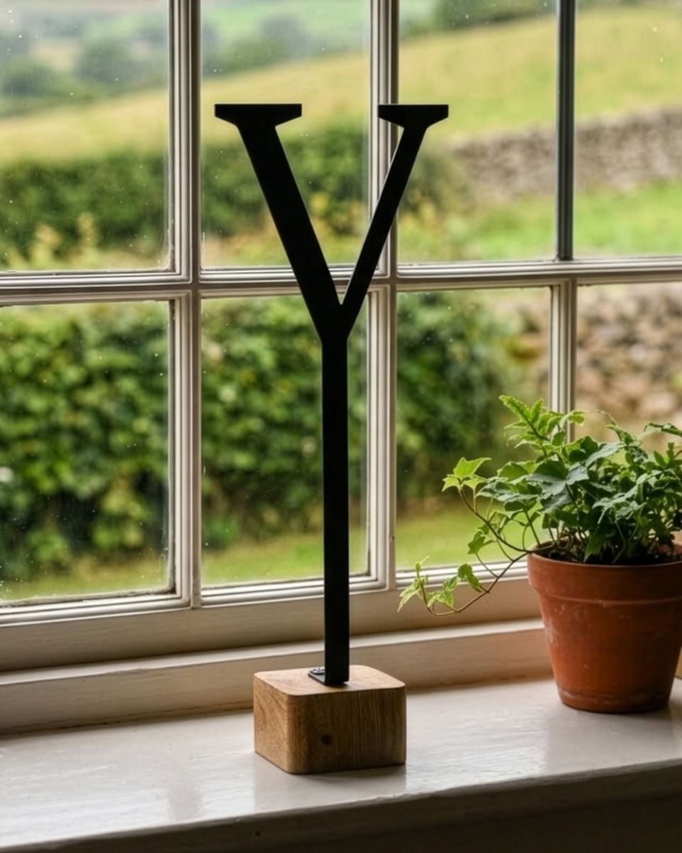 The Letter "V" Monograph Metal & Wood Letter Display Ornament Displayed in a Period Home - Digital Illustration 