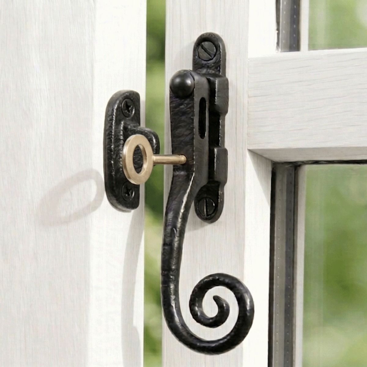 The Lockable Iron Casement Vent Fastener Fitted on a White Window Frame in a Country Home - Digital Illustration