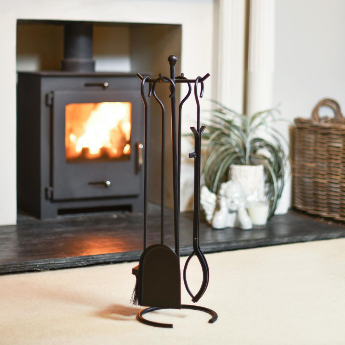 "The Lunatum" Four Piece Companion Set In A Fireplace Setting