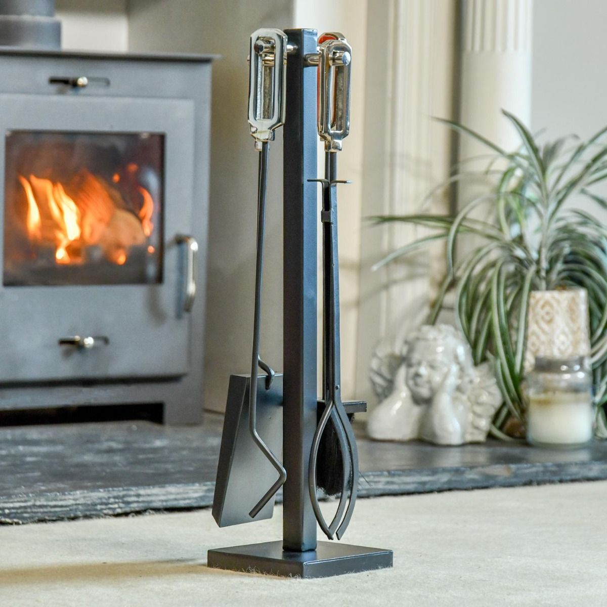 The Manhattan Square Black & Nickel Companion Set in a Modern Interior Setting next to a Log Burner Stove - Digital Illustration