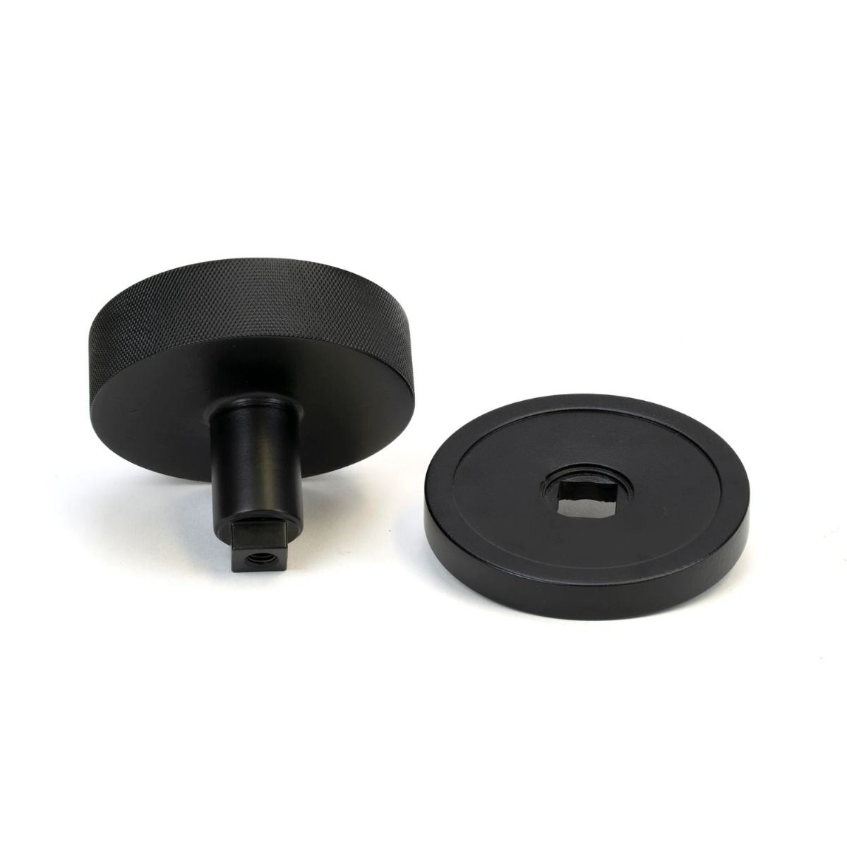 The Matt Black Knurled Centre Door Knob on a Plain Rose Displayed in Separate Sections 