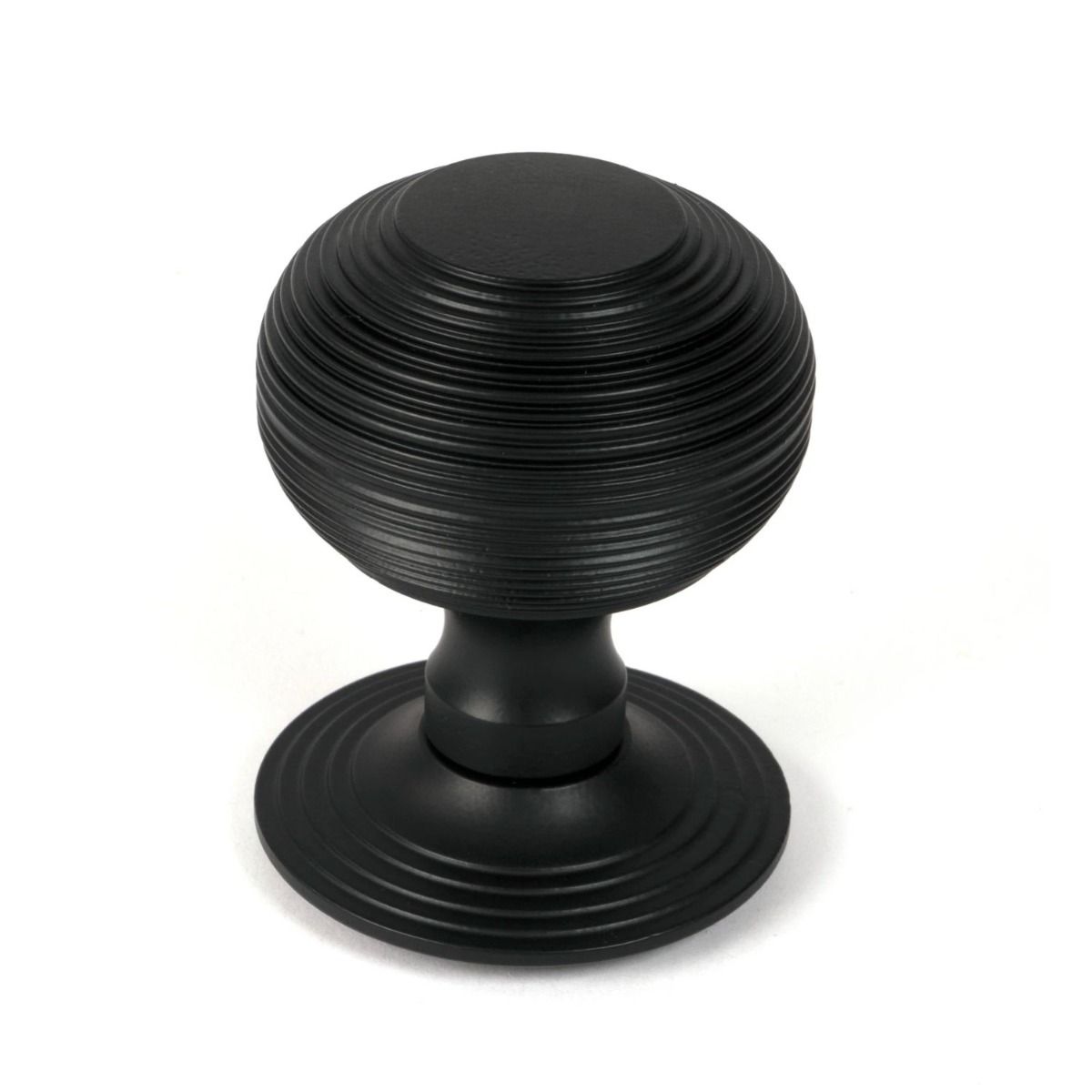 The Matt Black Traditional Beehive Centre Door Knob Shown Upright on a White Background 