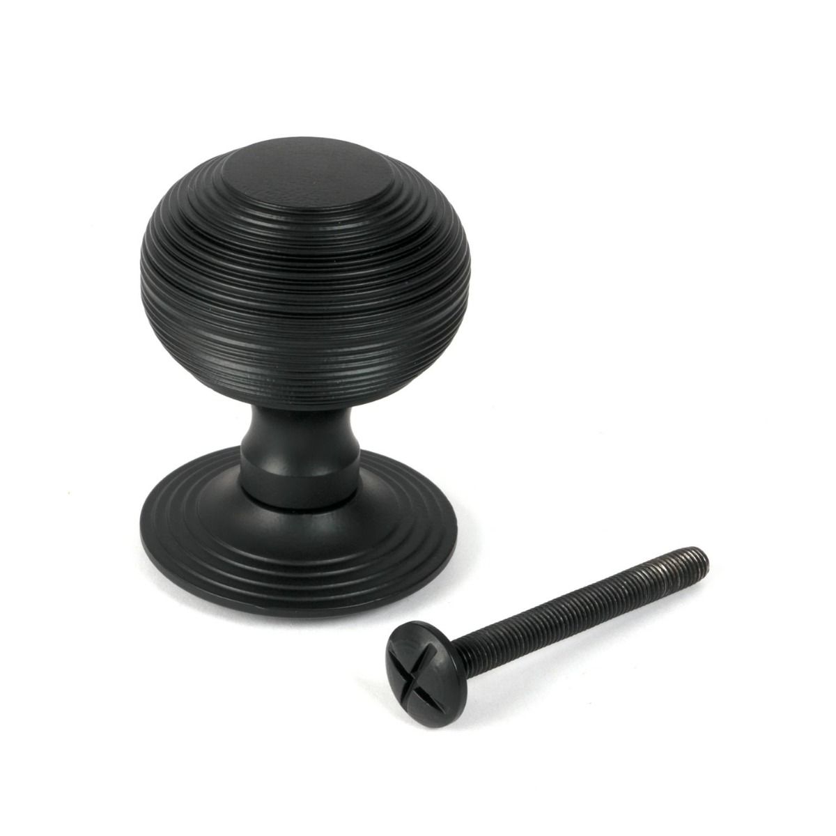 The Matt Black Traditional Beehive Centre Door Knob Shown Upright with Bolt 