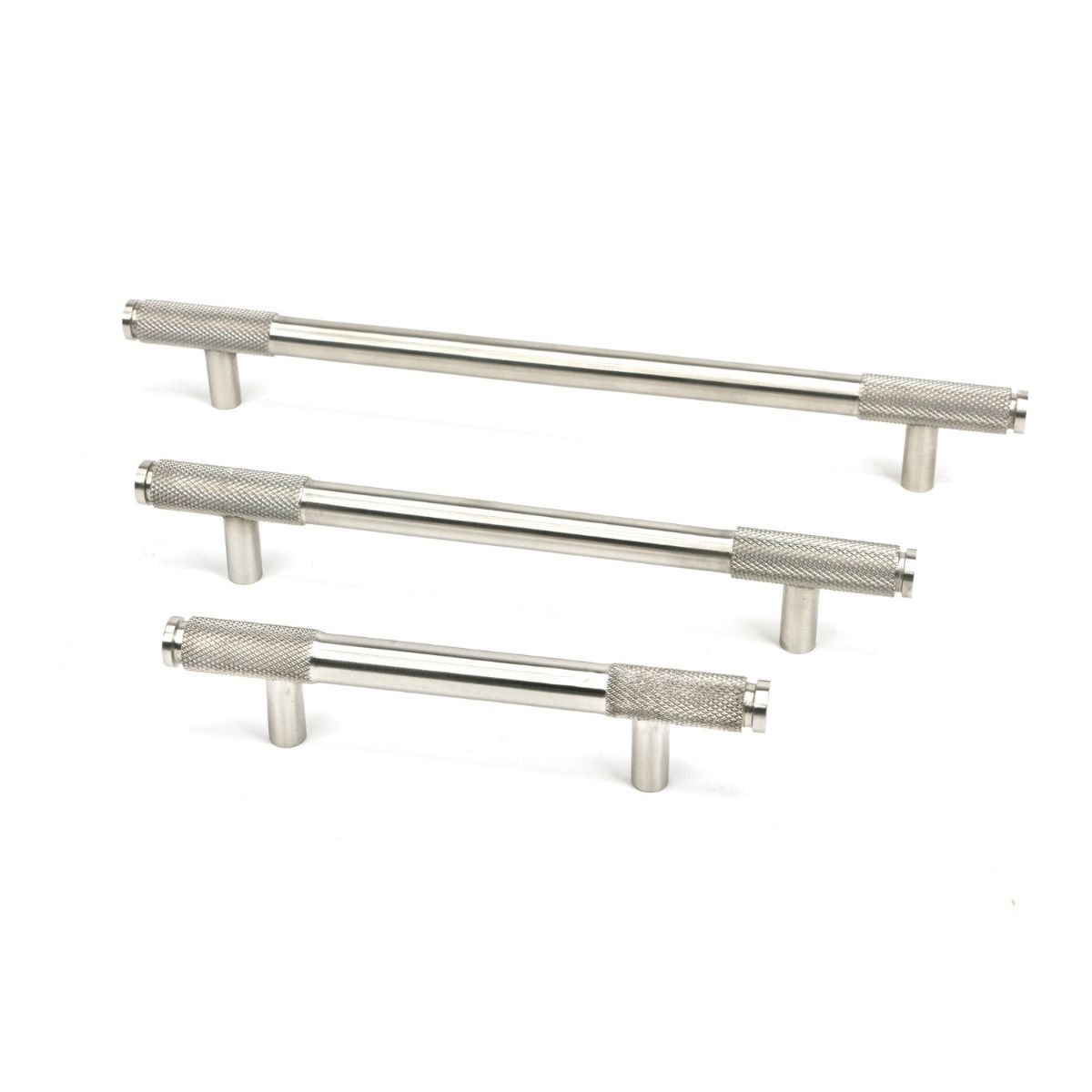 The Medium Half Knurled Cabinet Pull Handle in Satin Stainless Steel Shown Alongside Other Sizes on a White Background