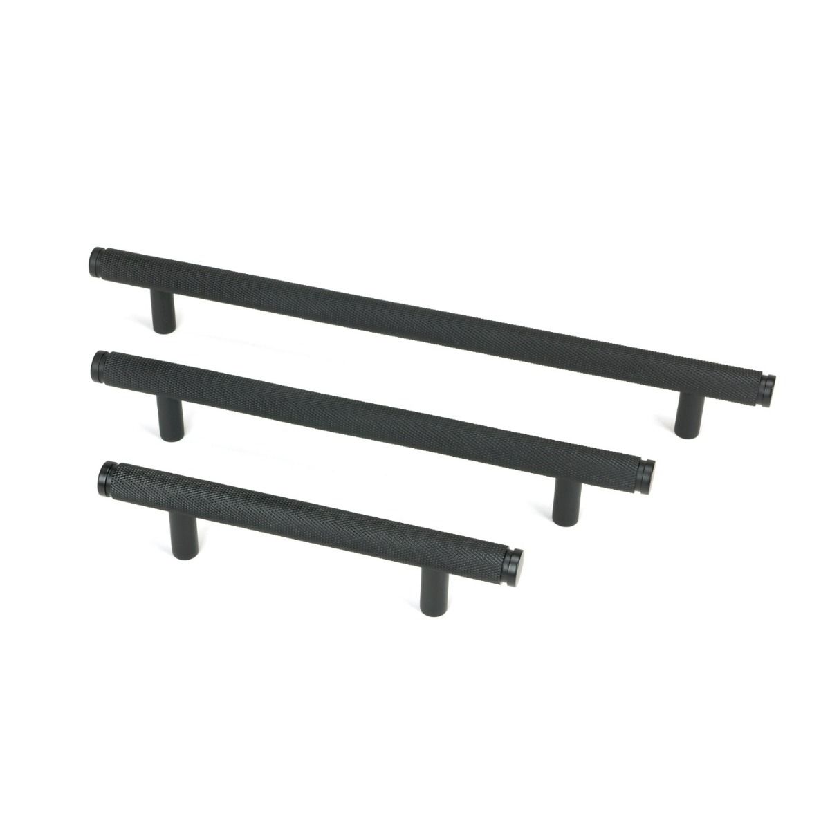 The Medium Knurled Cabinet Pull Handle in Matt Black Shown Alongside Other Sizes on a White Background