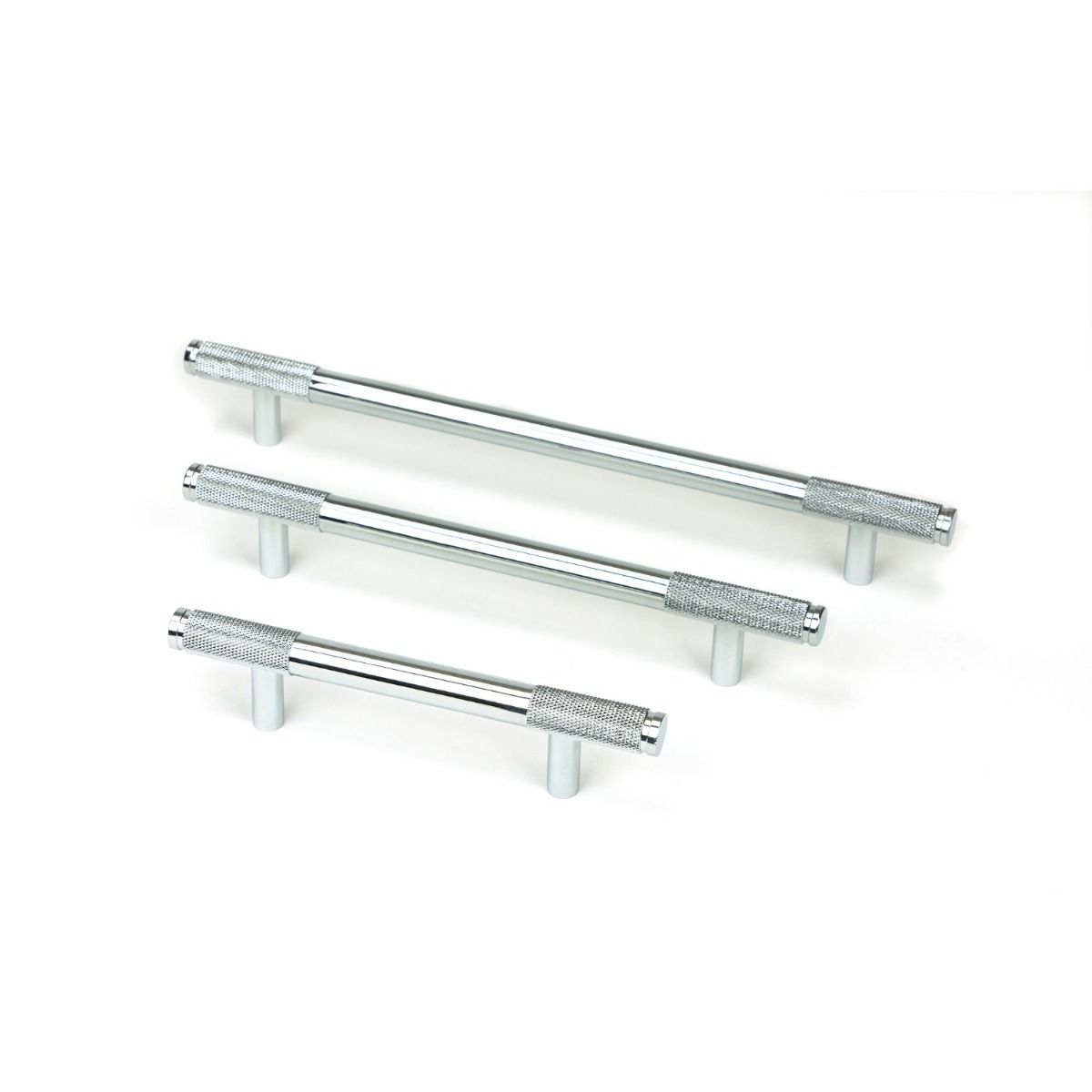 The Medium Knurled Cabinet Pull Handle in Polished Chrome Shown Alongside Other Sizes on a White Background