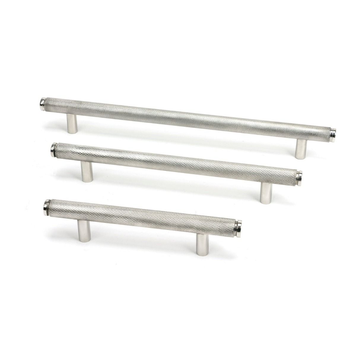 The Medium Knurled Cabinet Pull Handle in Satin Stainless Steel Shown Alongside Other Sizes on a White Background