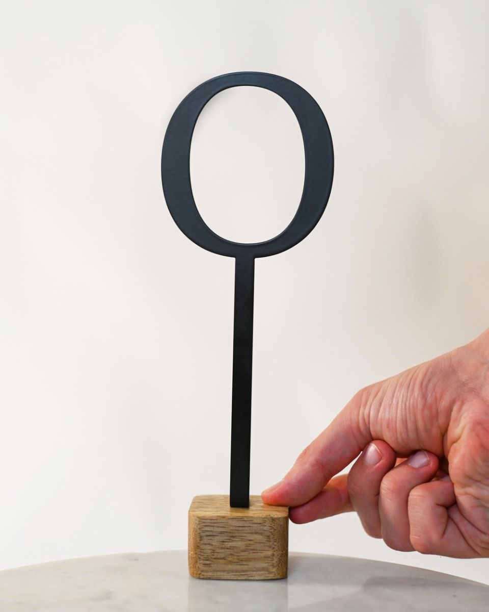 The Monograph Metal & Oak Letter Display Ornament Letter O with Hand in shot for Scale
