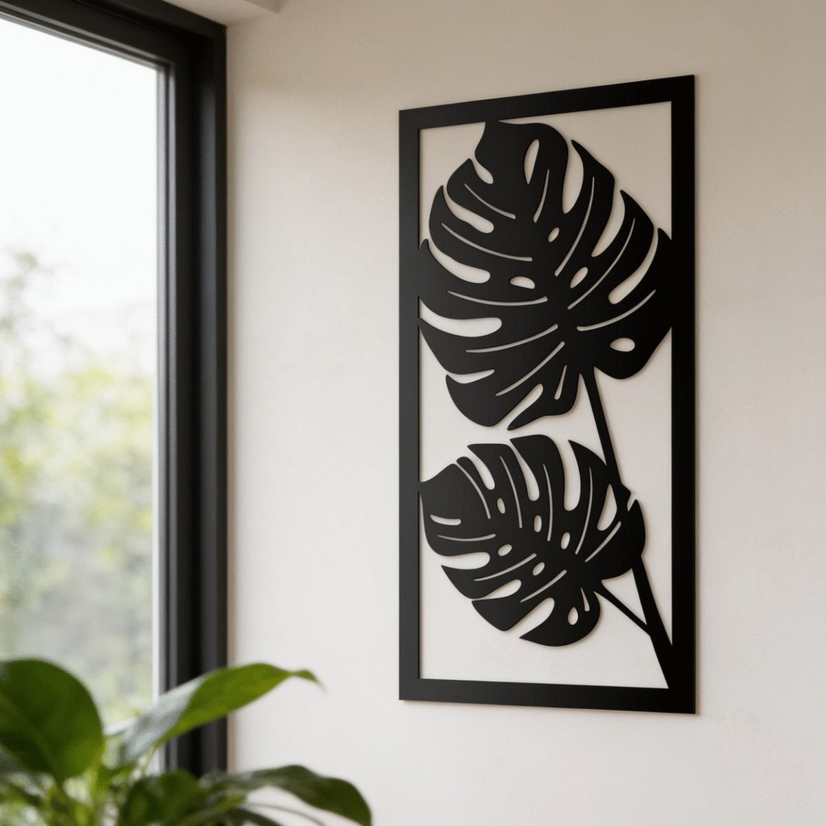 The Monstera Tropical Leaf Wall Art in a Rectangular Frame Placed on a Cream Coloured Wall in a Modern Home - Digital Illustration