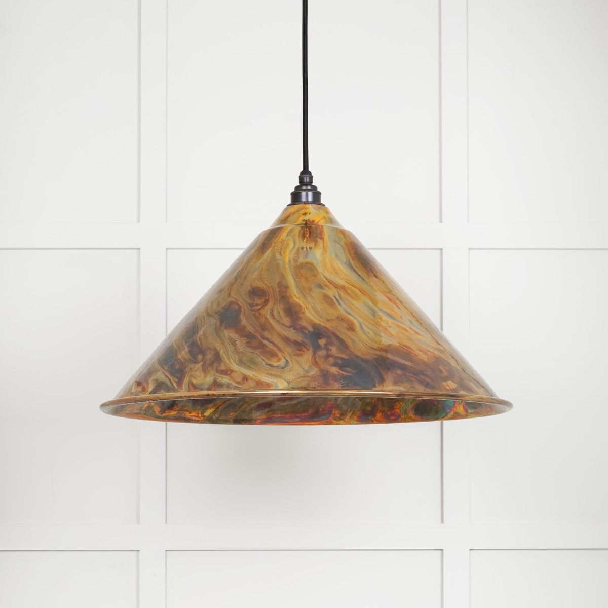 The Nidus Pendant Light in a Burnished Finish on a White Panelled Background with Light off