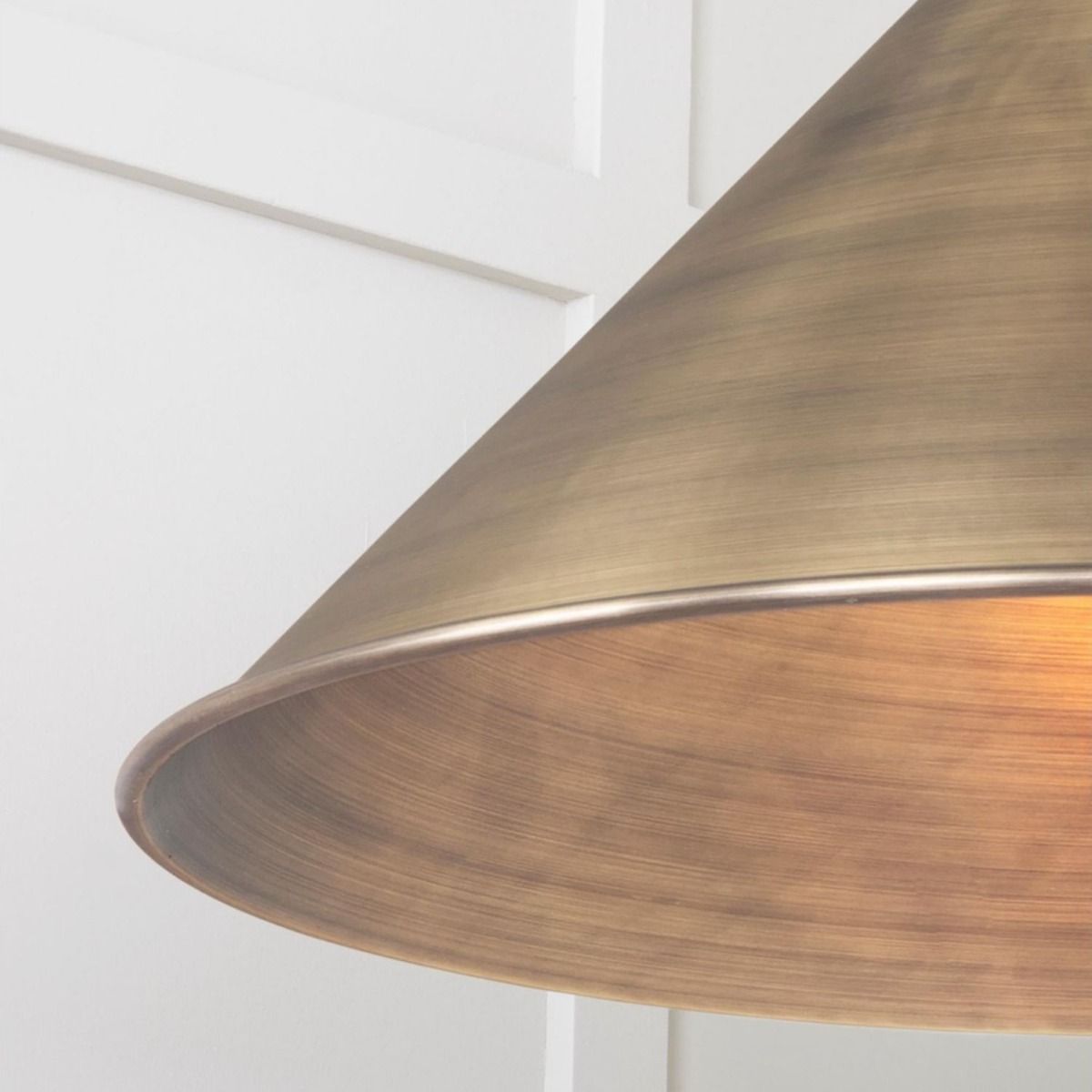 The Nidus Pendant Light in Aged Brass Showing a Close up of the Lamp Shade