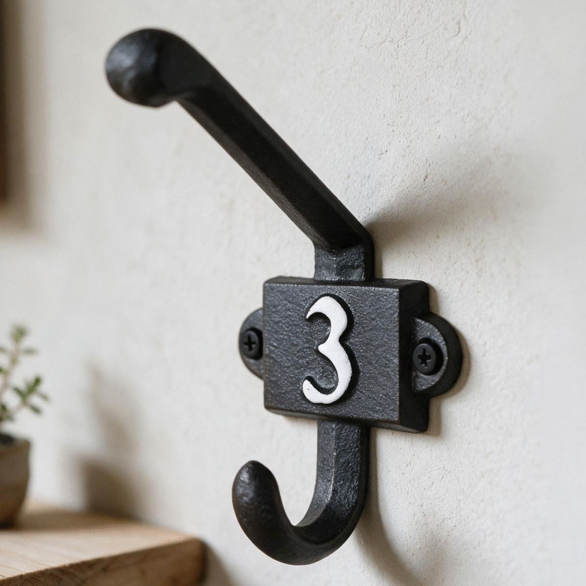 The Number 3 Iron Coat Hook on a Cream Coloured Hallway Wall - Digital Illustration