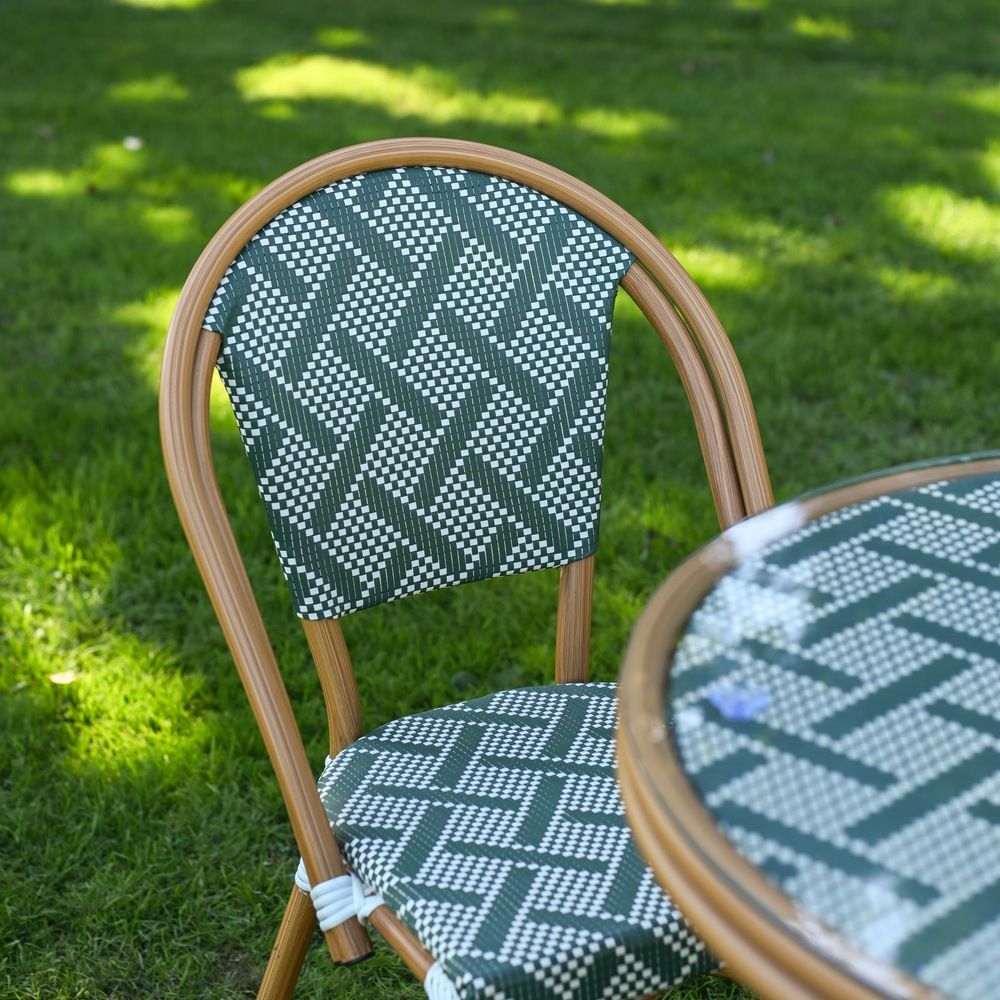 The Orbis Diamond 4-Seater Bistro Dining Set in Green & White Showing the Patterned Backrest of the Chair
