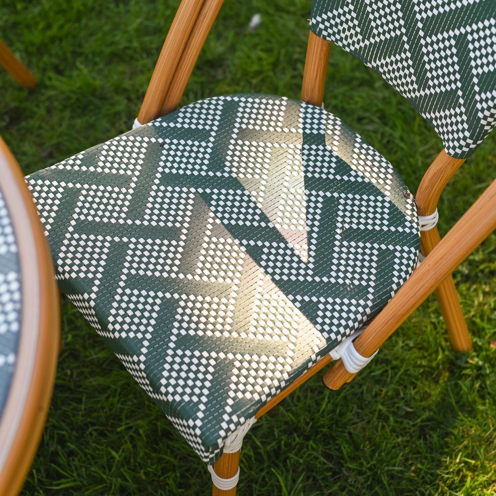 The Orbis Diamond 4-Seater Bistro Dining Set in Green & White Showing the Patterned Seat of the Chairs