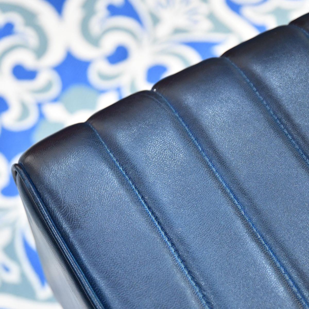 Blue Leather on the Seat of the Stool
