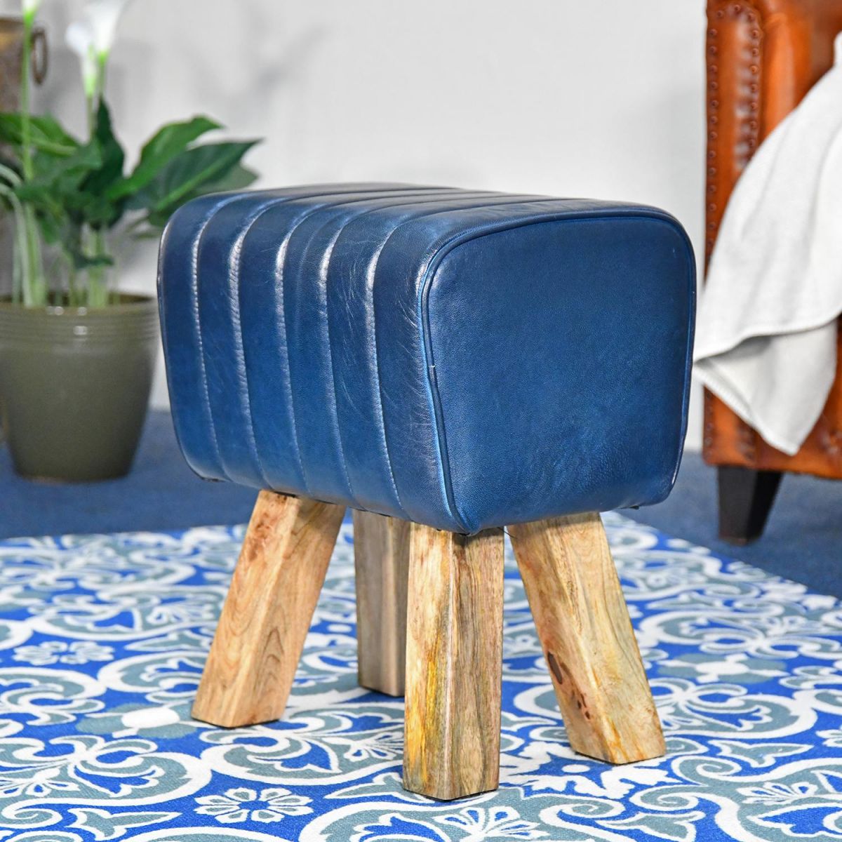 "The Orton" Mango Wood & Blue Leather Bug Stool in the Living Room