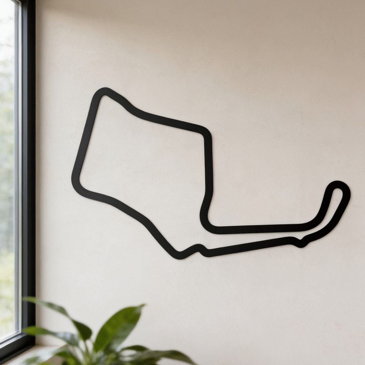 The Oulton Park Motor Track Black Wall Art bold line of the Track on a Magnolia Coloured Wall - Digital Illustration