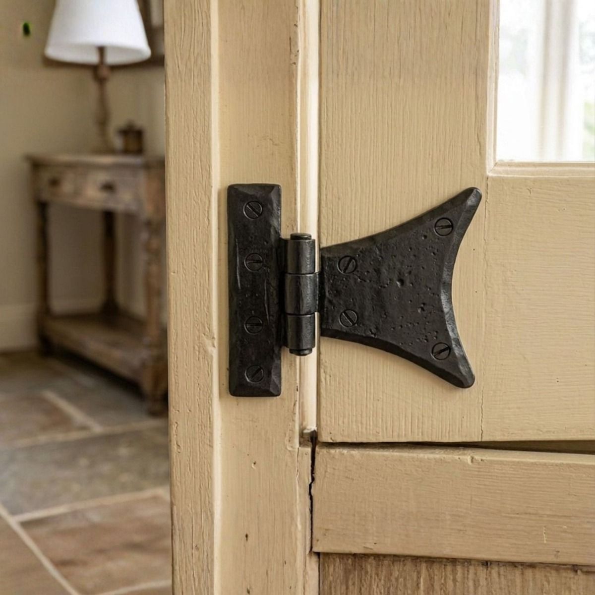 The Pair Of Small Beeswax Half Butterfly Hinges on a Cream Door in a Cottage - Digital Illustration