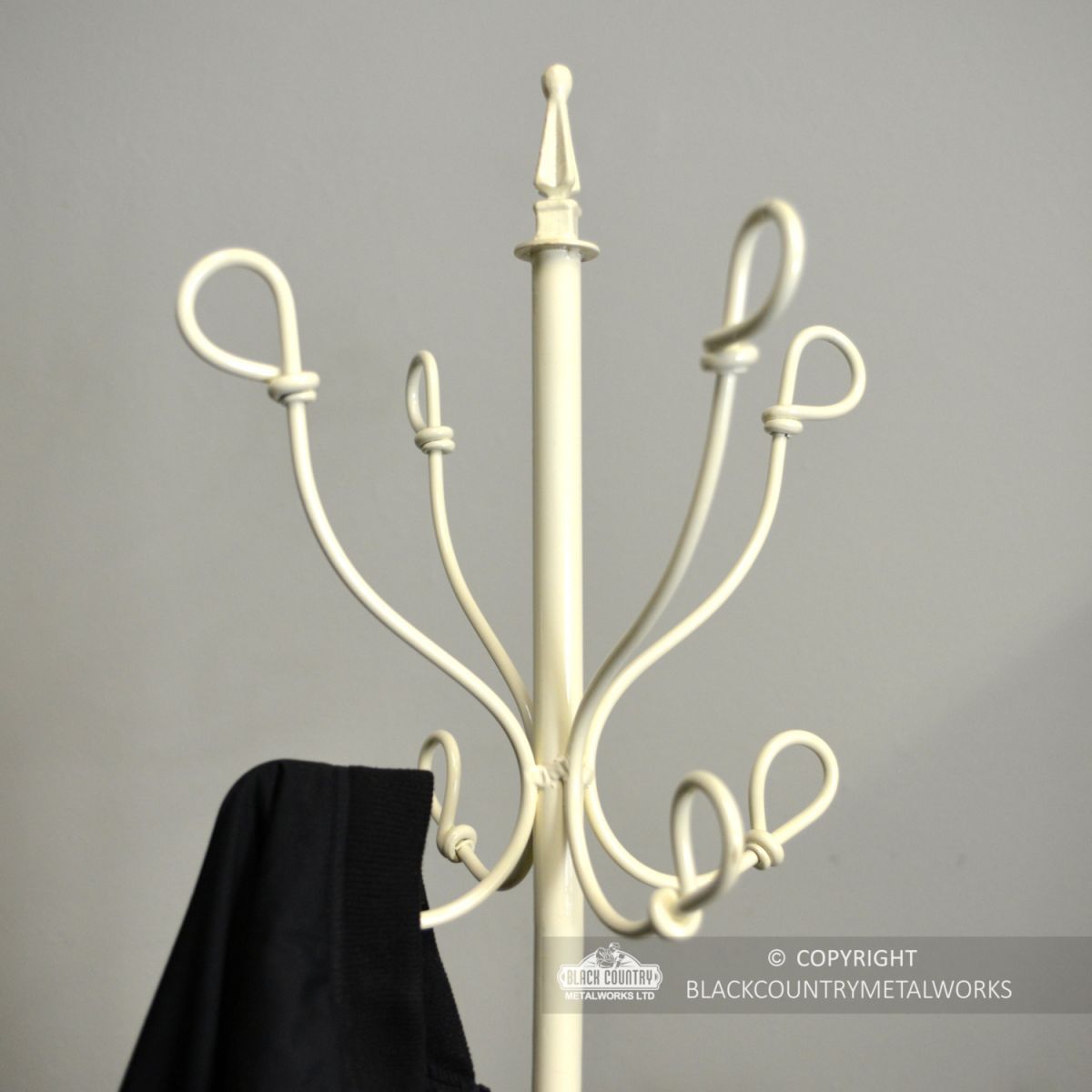 Close-up of the Top of the Cream Hat & Coat Stand