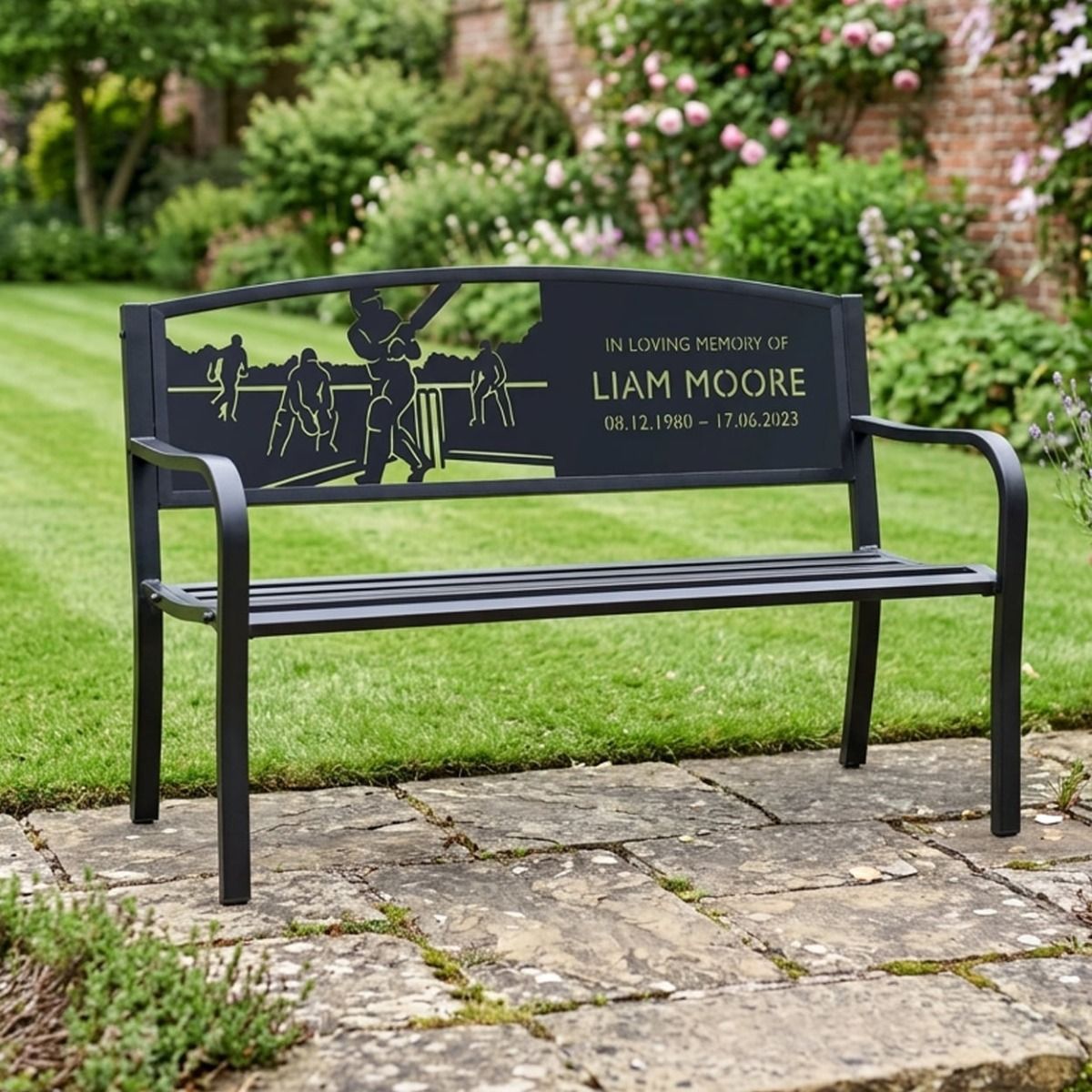 The Personalised Cricketer Iron & Steel Park Bench used as a Memorial to a Loved one with Name and Dates in a Cottage Garden - Digital Illustration 