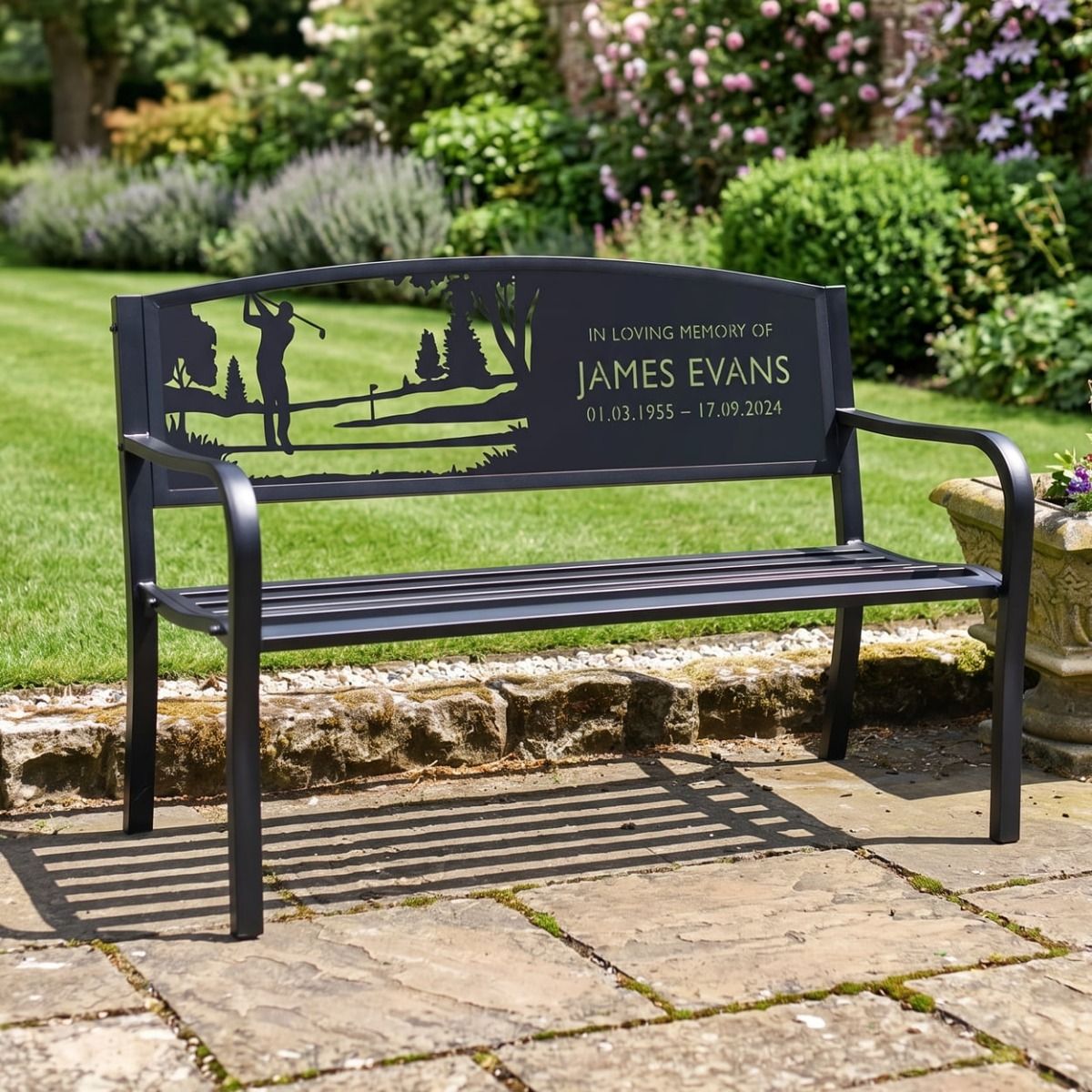 The Personalised Male Golfer Iron & Steel Park Bench Used as a Memorial to a Loved One in a Country Garden Setting - Digital Illustration 