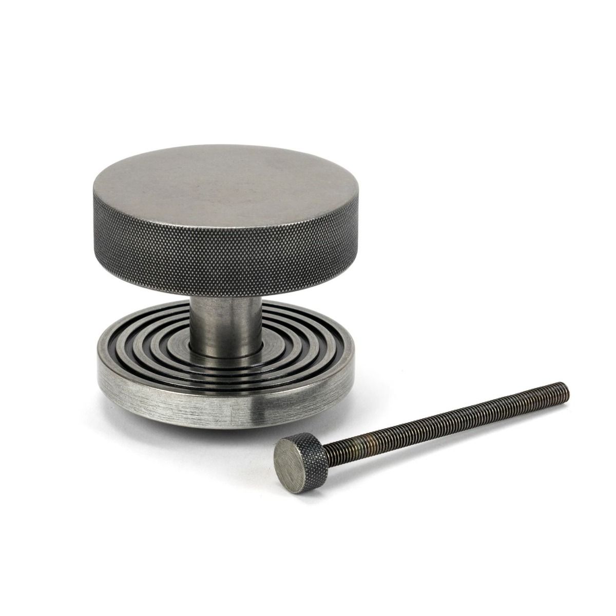 The Pewter Knurled Centre Door Knob on a Beehive Rose with Bolt Fitting on a White Background 