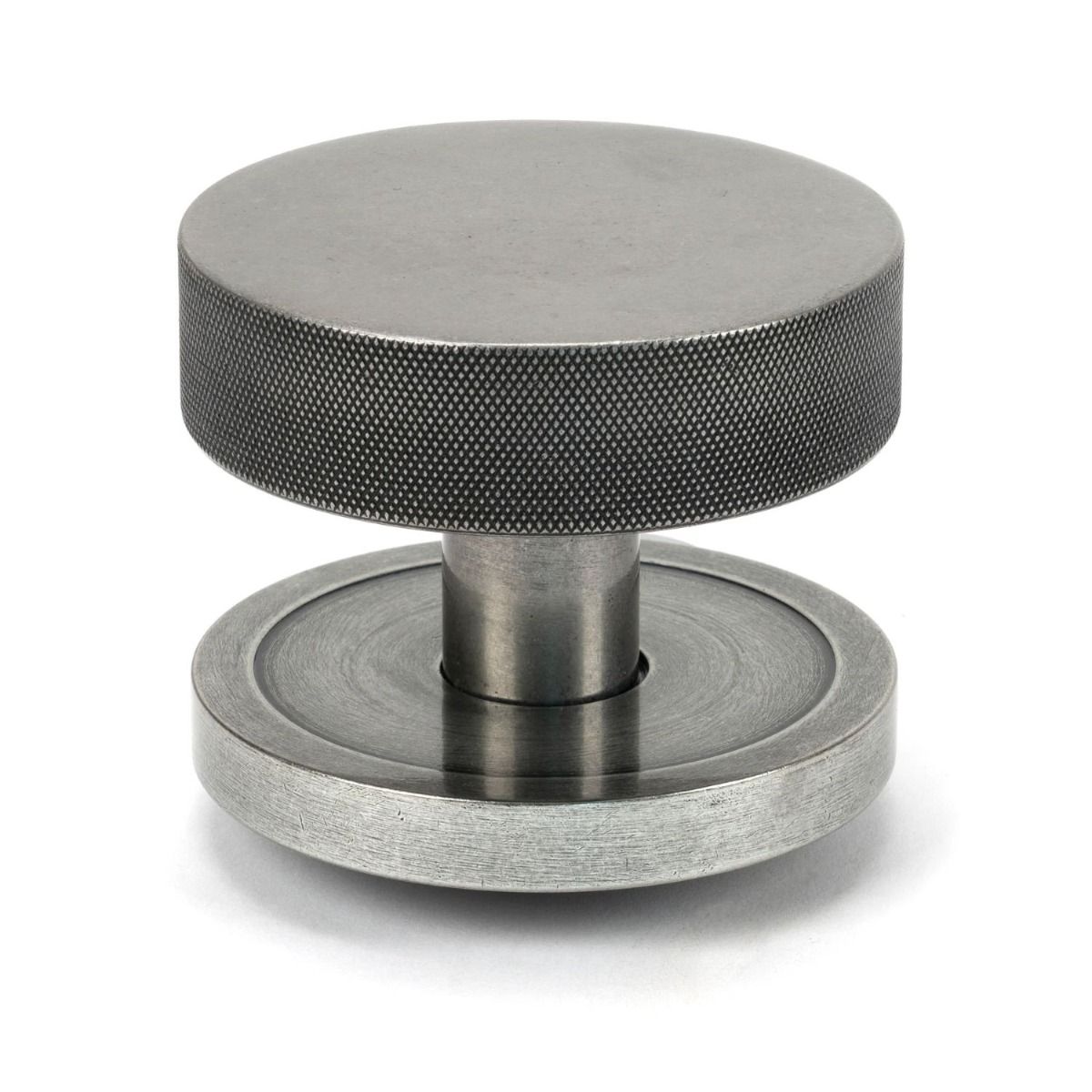 The Pewter Knurled Centre Door Knob on a Plain Rose Shown Upright on a White Background 