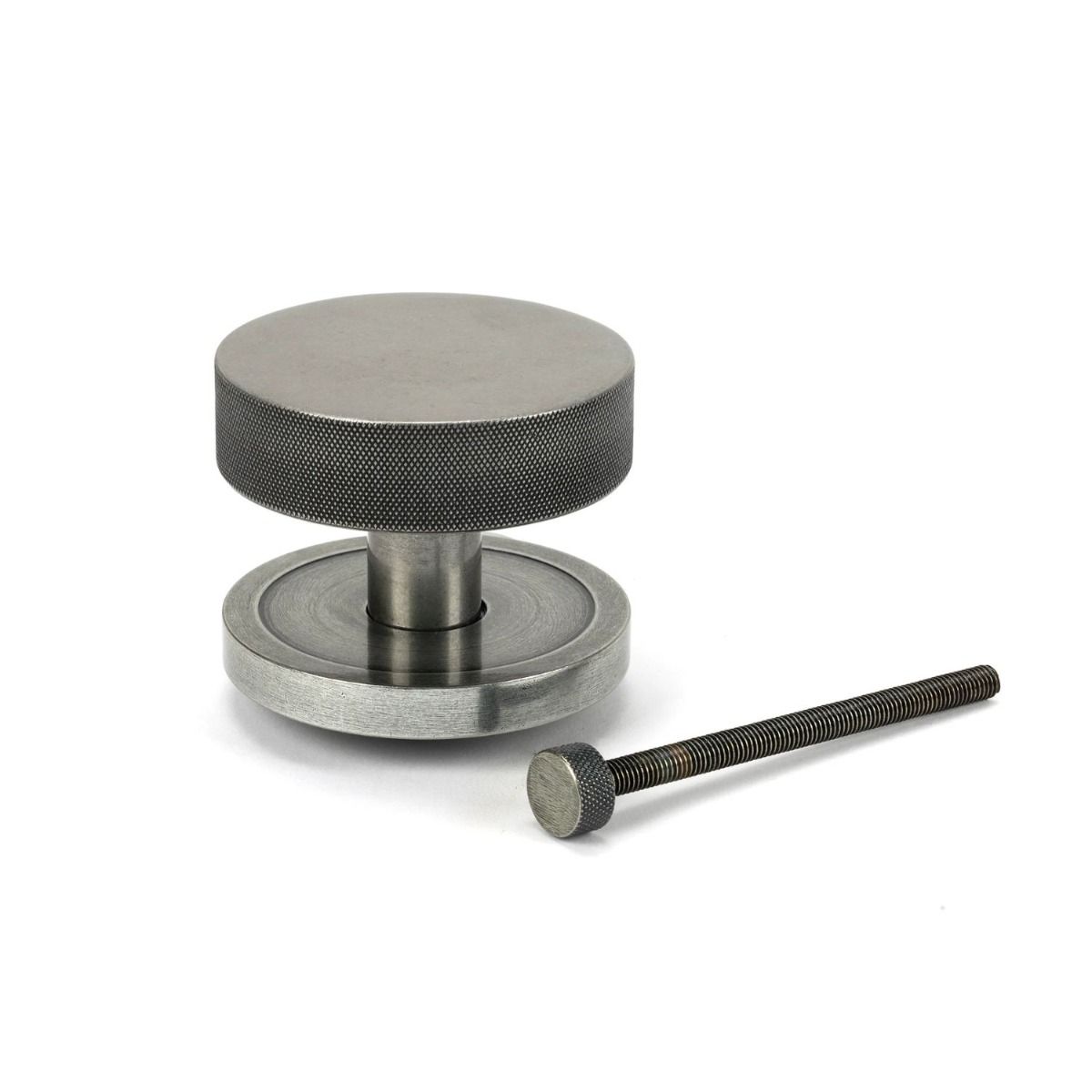The Pewter Knurled Centre Door Knob on a Plain Rose with Bolt Fitting 