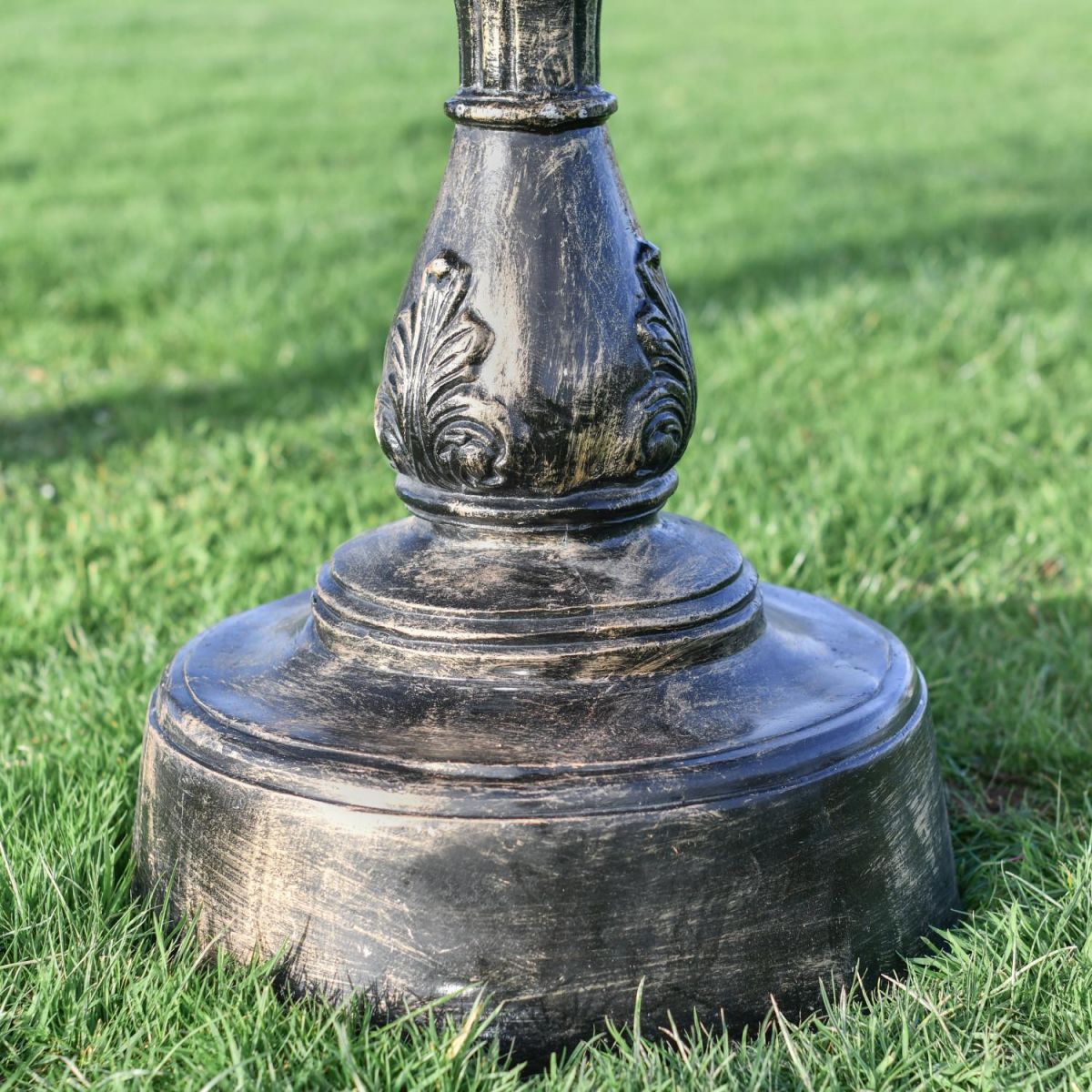 Close Up Of Brushed Gold "Plumis" Bird Bath Base