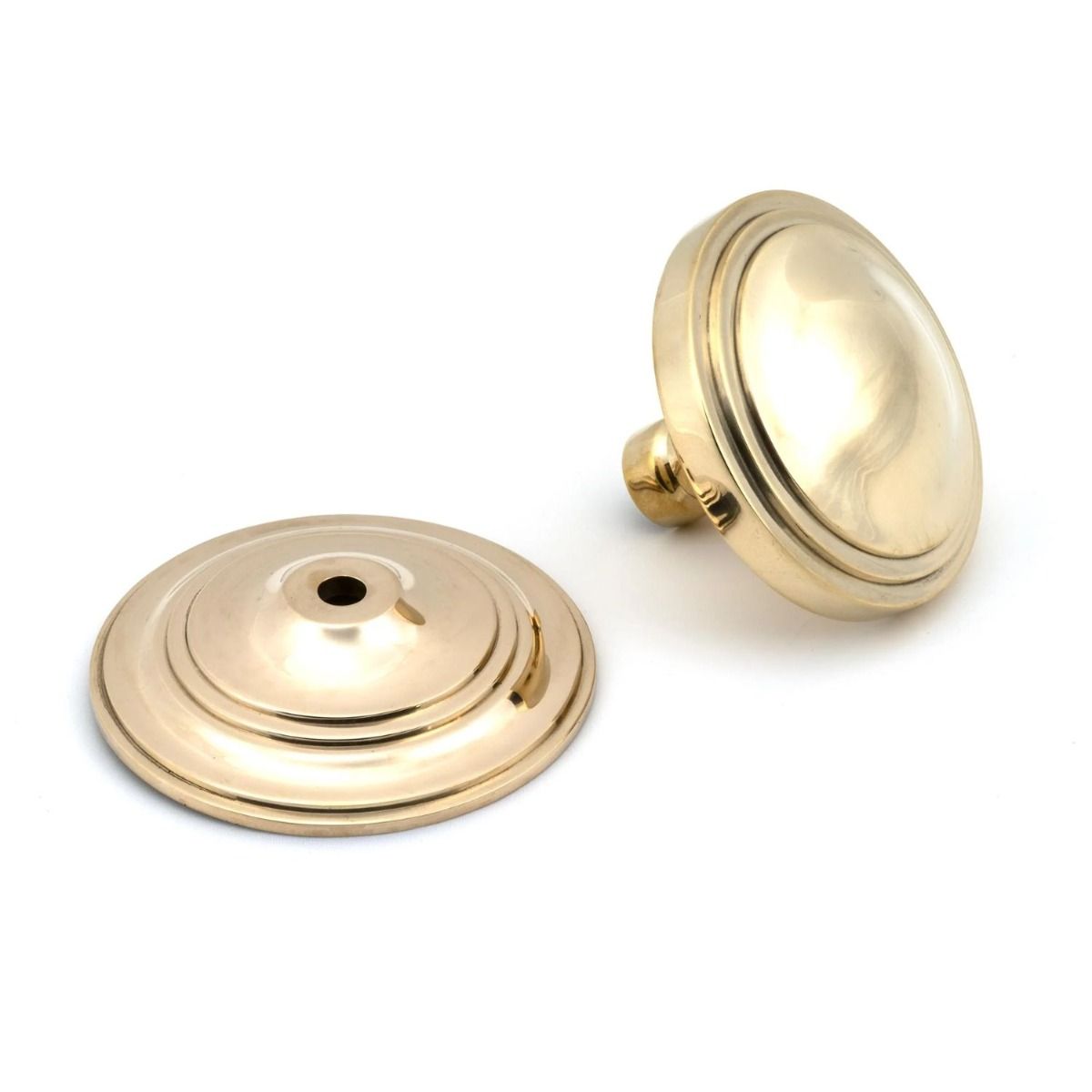 The Polished Brass Art Deco Stepped Centre Door Knob Shown with the Rose