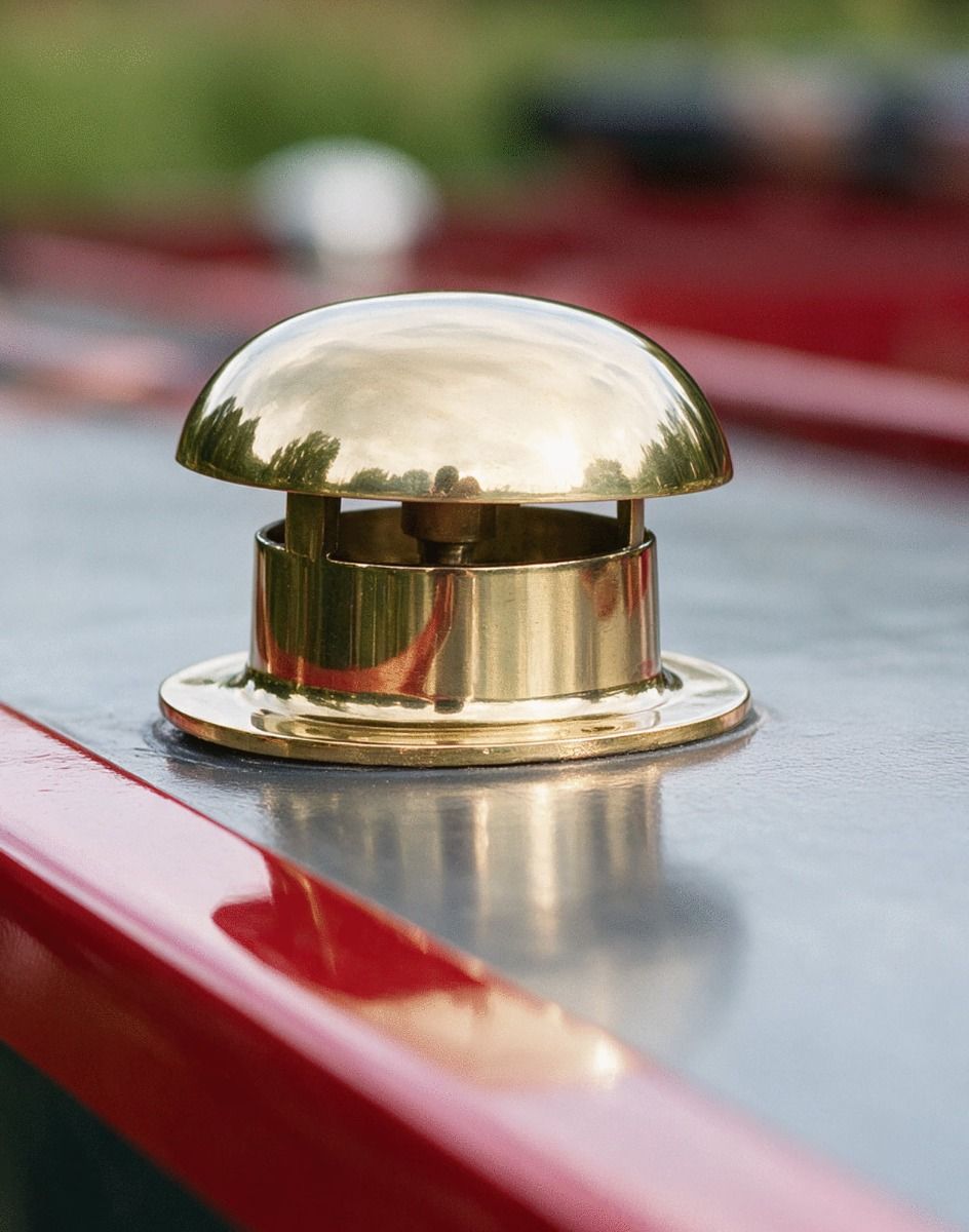 The Polished Brass Mushroom Vents Shown on the Top of a Canal Boat in a Countryside - Digital Illustration