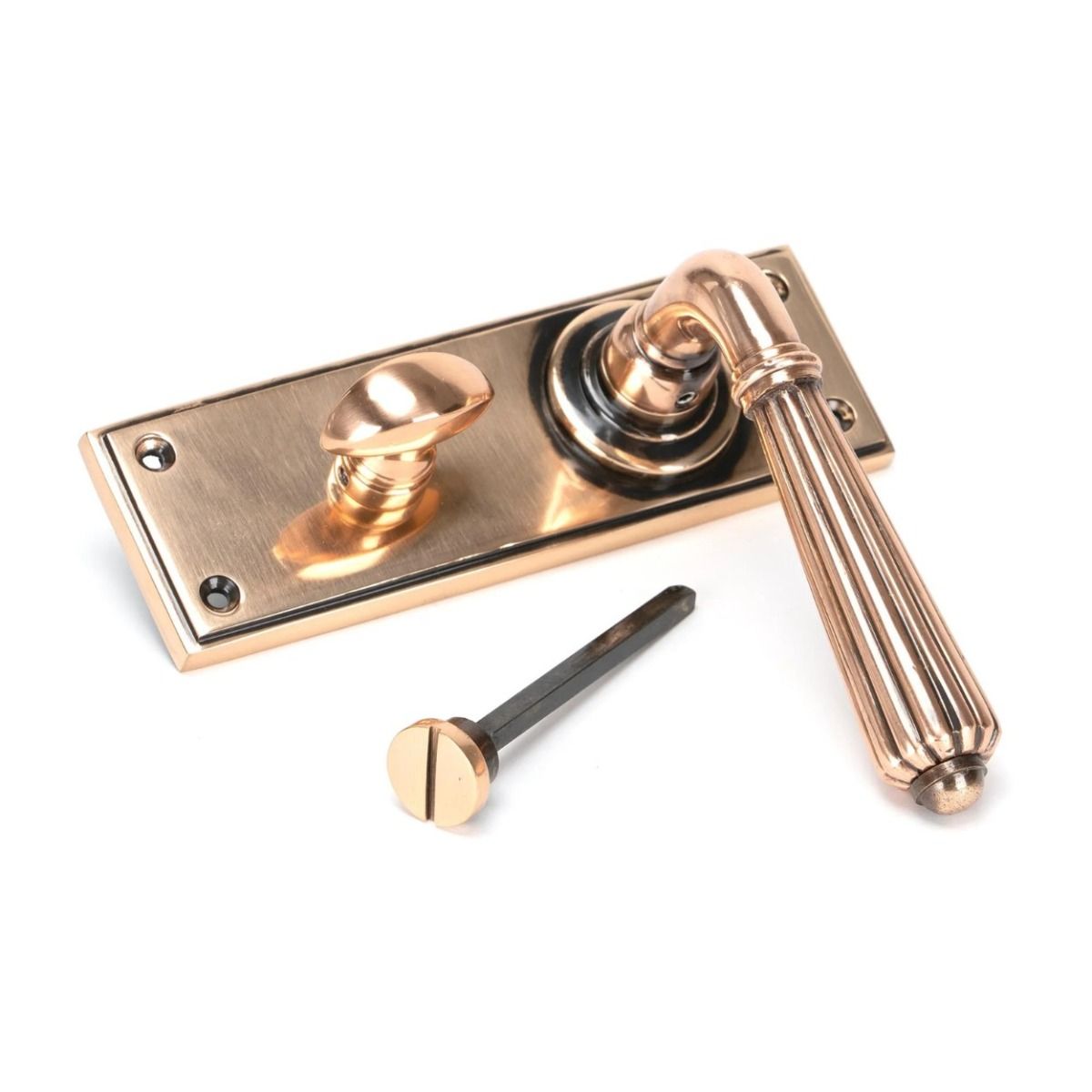 The Polished Bronze Classic Fluted Period Privacy Suite Bathroom Lever Handles Shown on its Side 