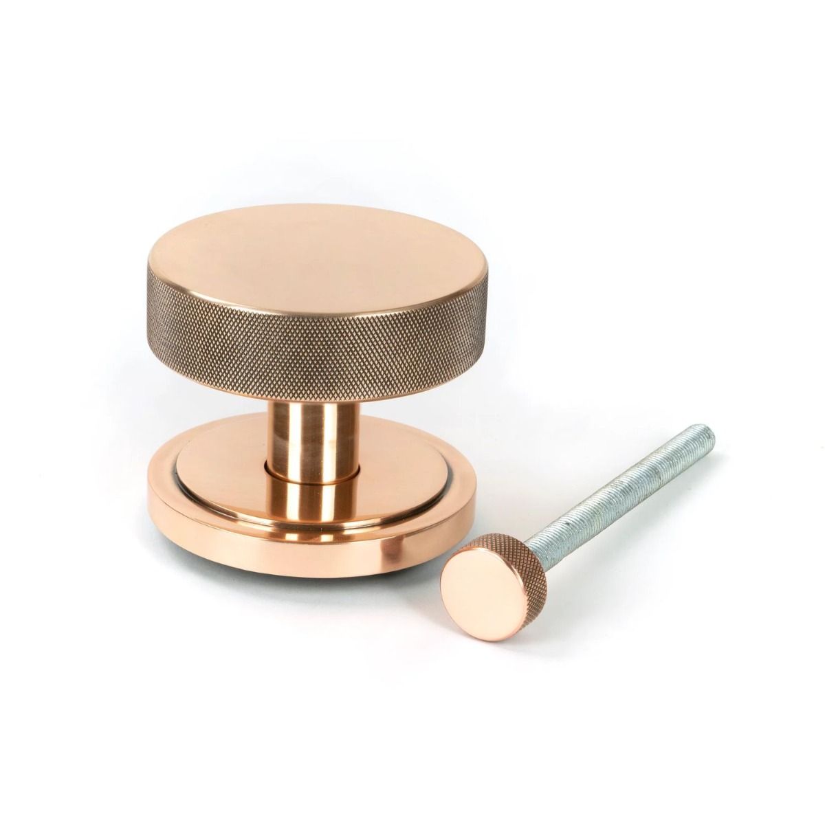 The Polished Bronze Knurled Centre Door Knob on an Art Deco Rose with Bolt Fitting 