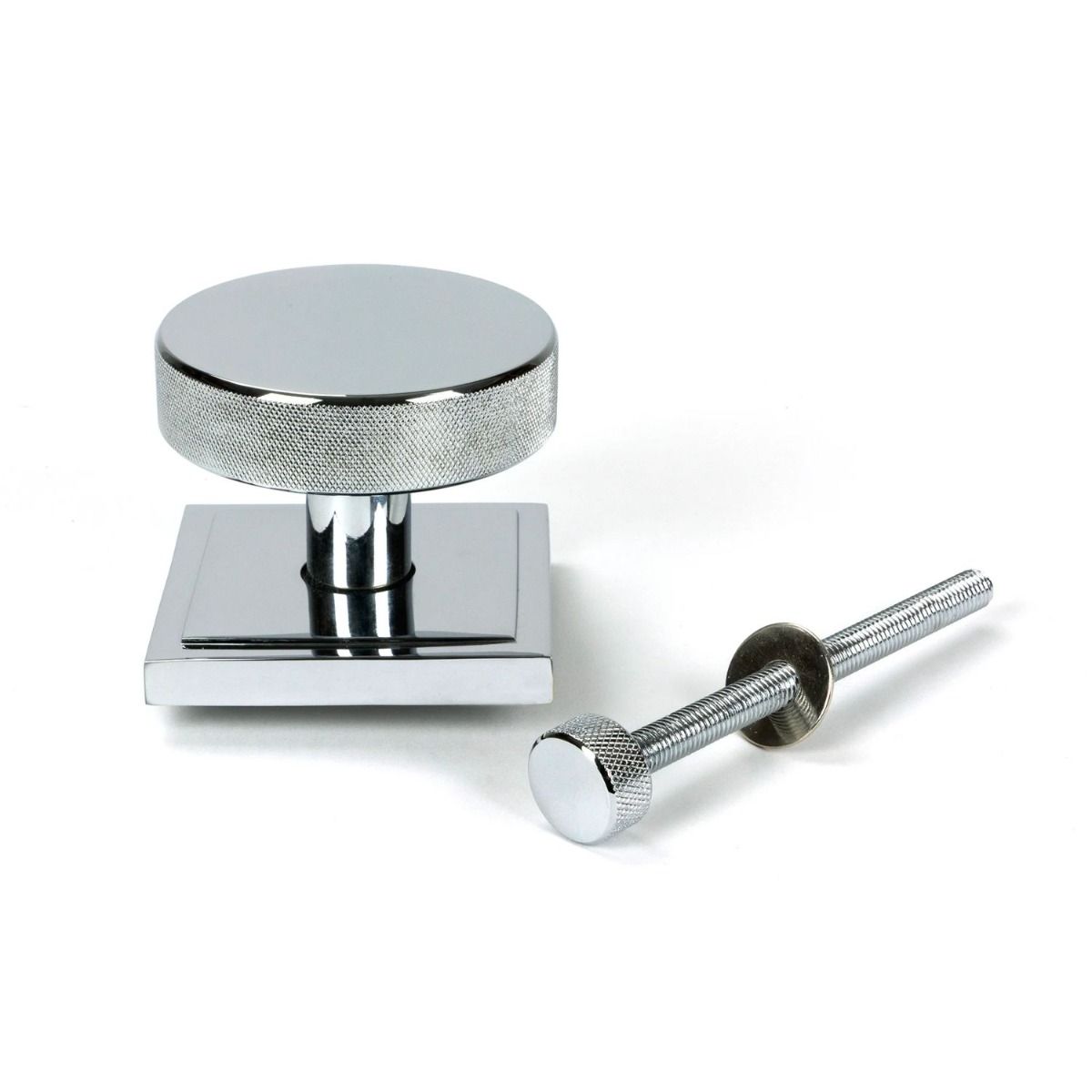 The Polished Chrome Knurled Centre Door Knob on Square Rose with Bolt Fitting 