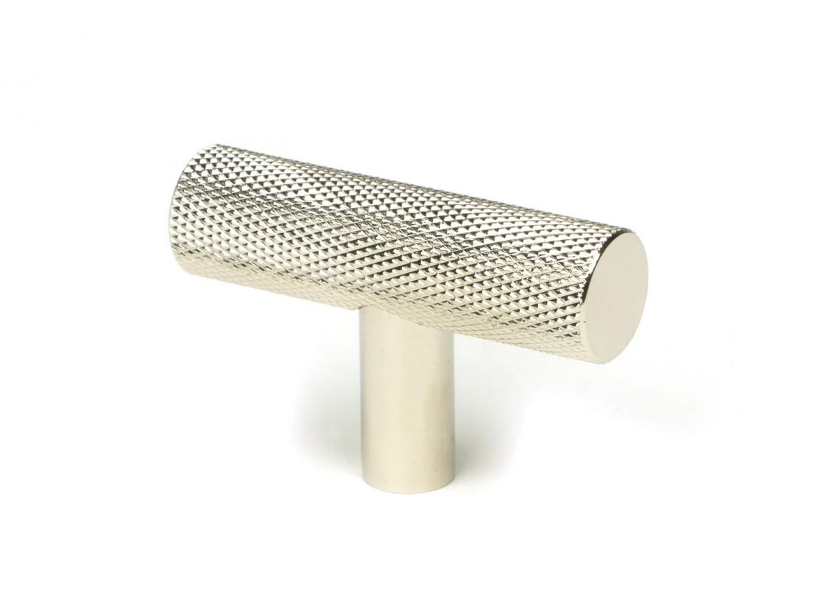 The Polished Nicked "Astor" Knurled Industrial T-Bar Cabinet Fitting Displayed on a White Background Shown at an Angle
