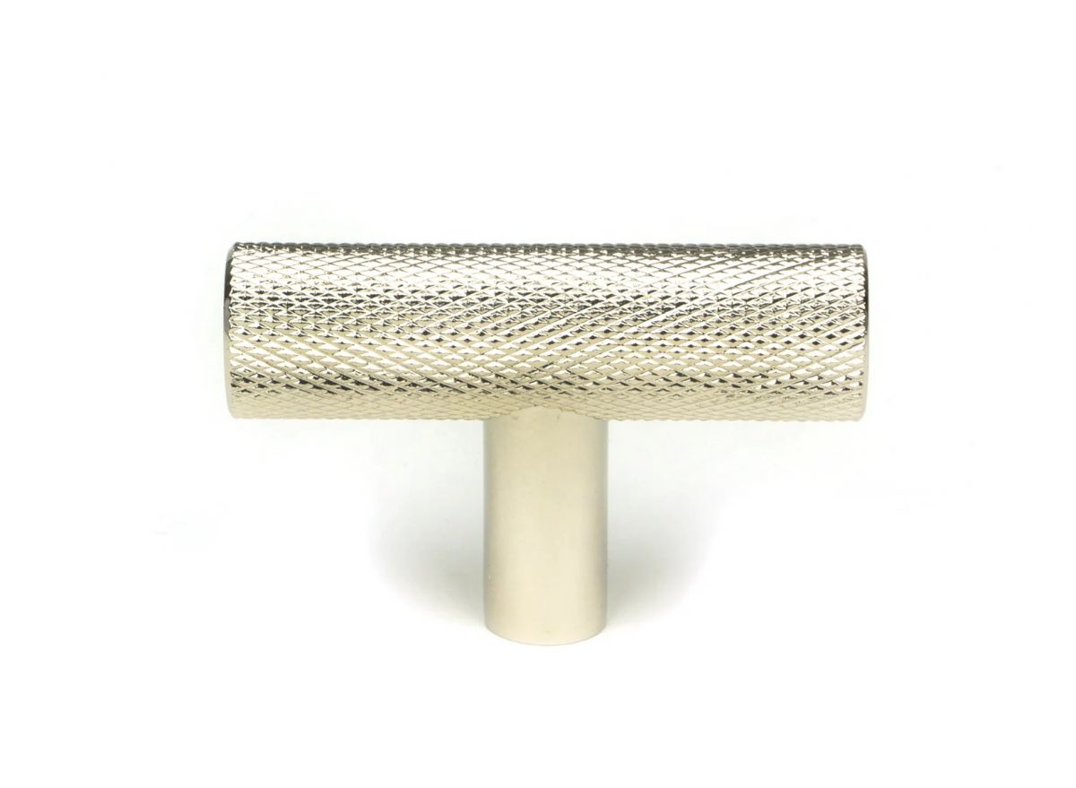 The Polished Nicked "Astor" Knurled Industrial T-Bar Cabinet Fitting Displayed on a White Background Shown from the Front